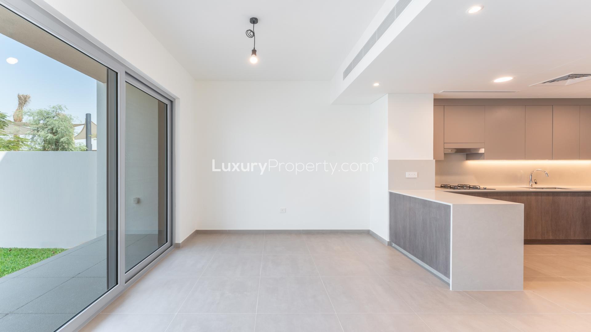 Modern kitchen in 3-bedroom townhouse for rent in Elan, Tilal Al Ghaf community