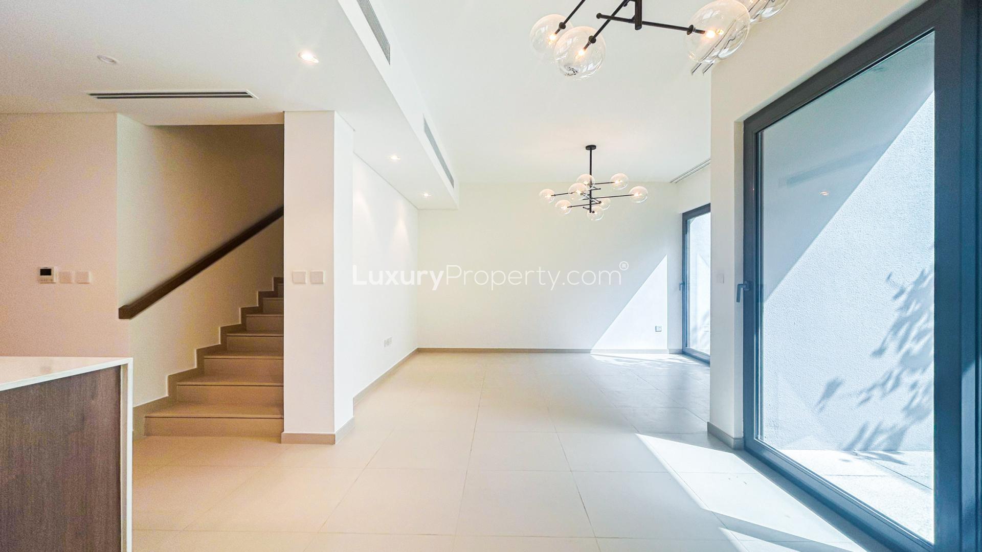 Modern 3-bedroom townhouse exterior in Elan, Tilal Al Ghaf, Dubai, available for rent