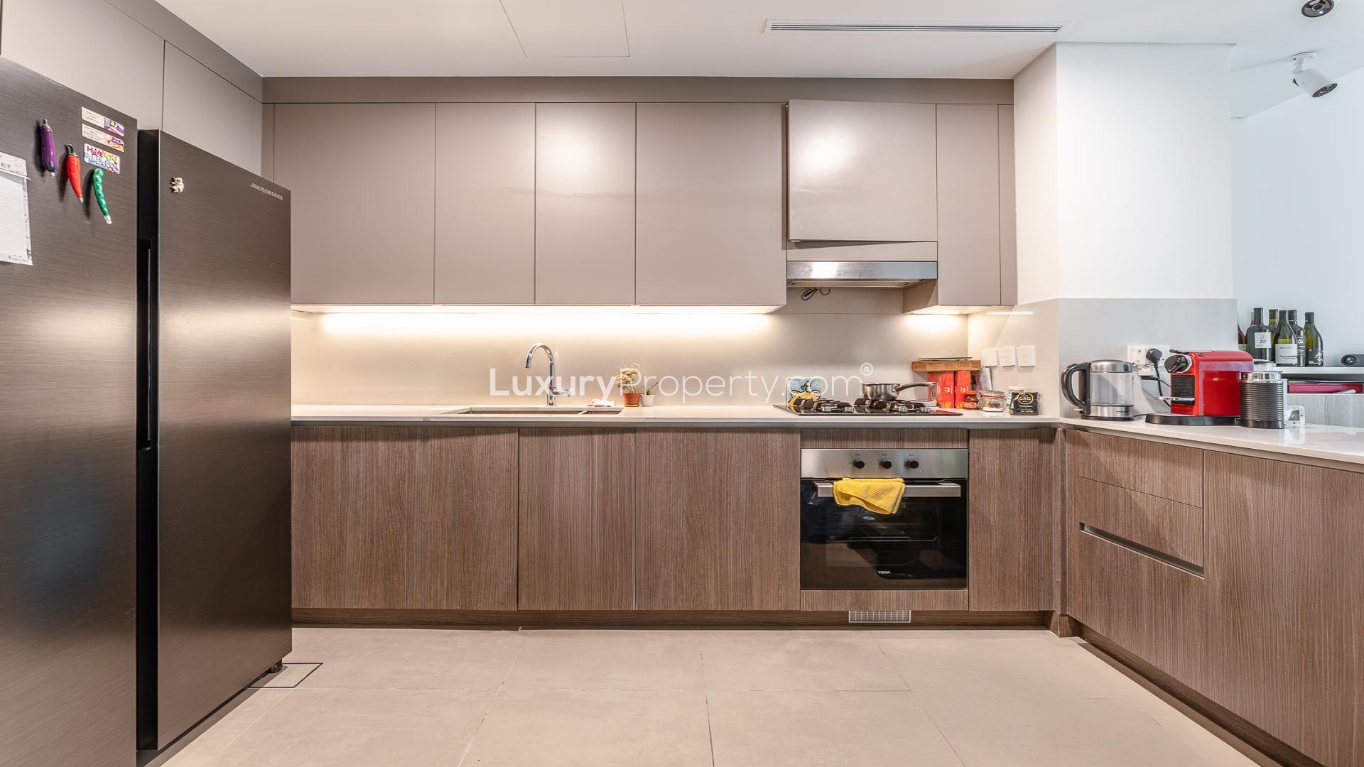 Townhouse exterior in Elan, Tilal Al Ghaf with patio and garden, available for rent