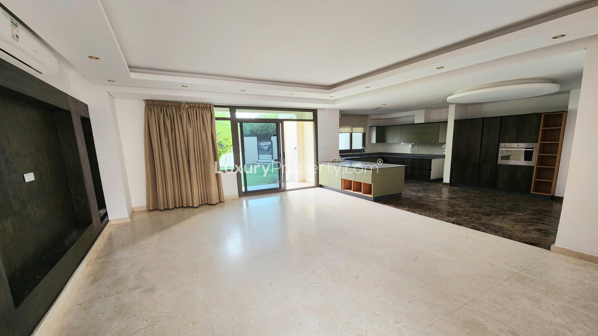 Exterior view of stylish 3-bedroom townhouse with garden in Zahra, Town Square Dubai