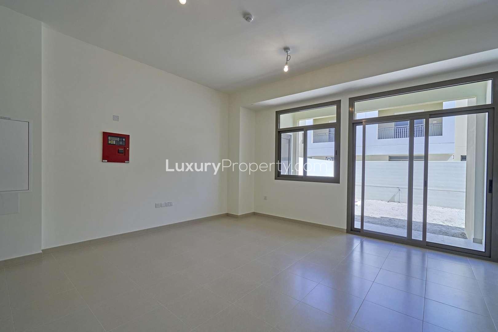 Stunning 3-bedroom townhouse exterior in Naseem, Town Square, available for rent