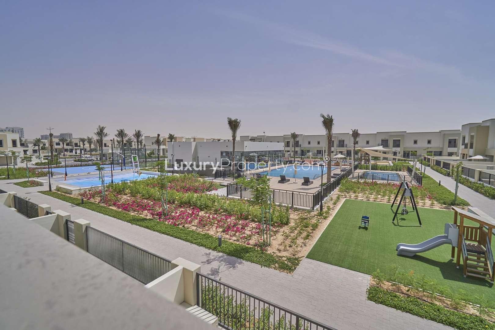 Spacious kitchen and living area in 3-bedroom townhouse, Town Square, Naseem Townhouses