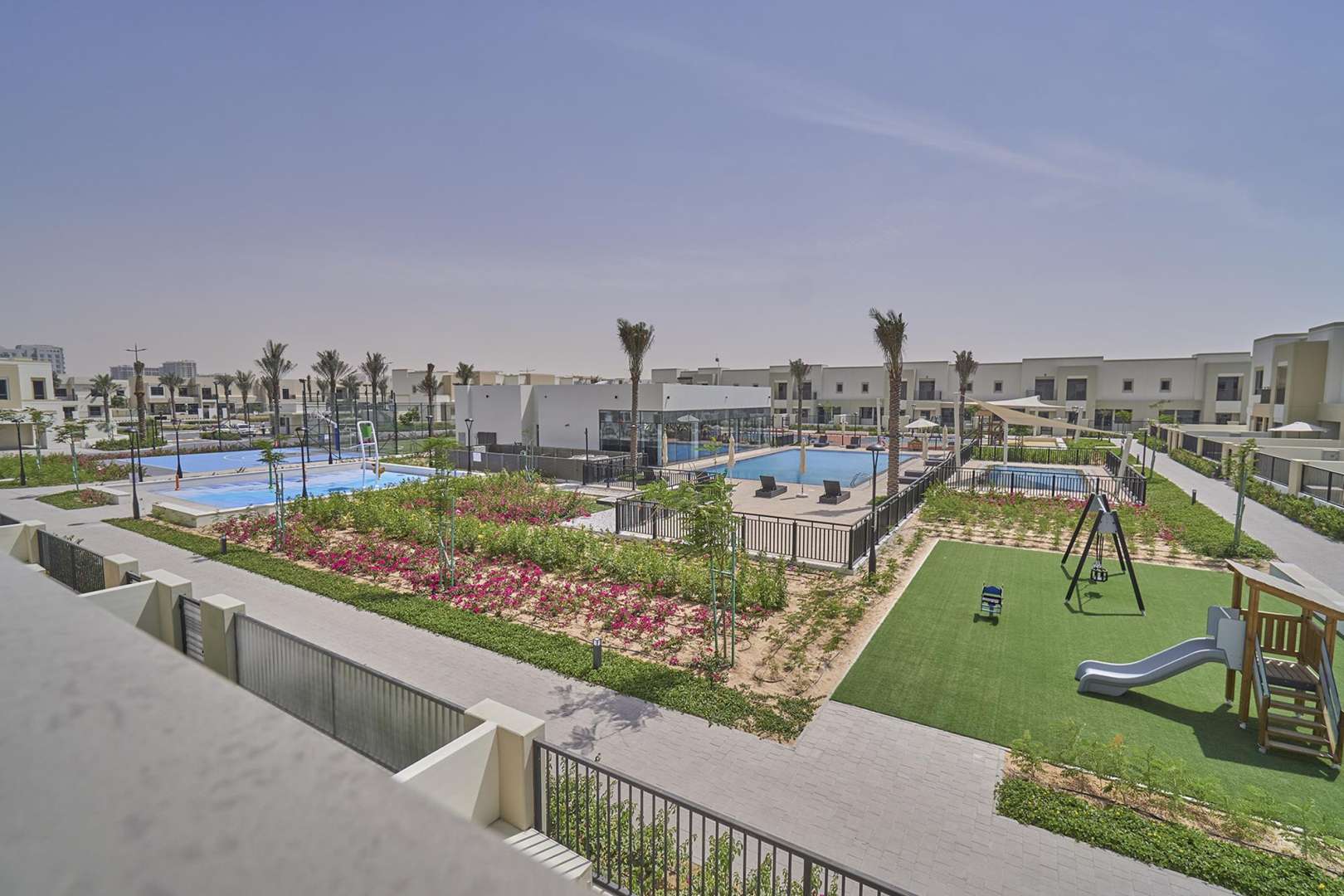 Spacious kitchen and living area in 3-bedroom townhouse, Town Square, Naseem Townhouses