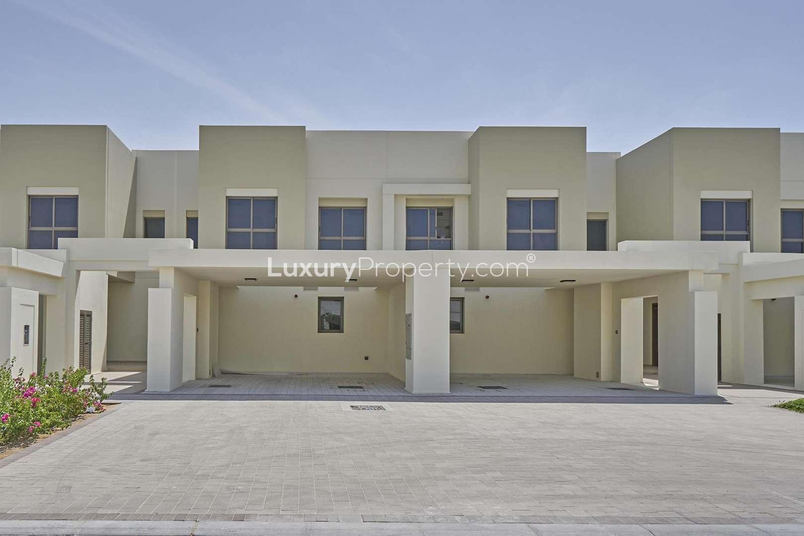 Exterior view of 3-bedroom townhouse for sale in Naseem, Town Square