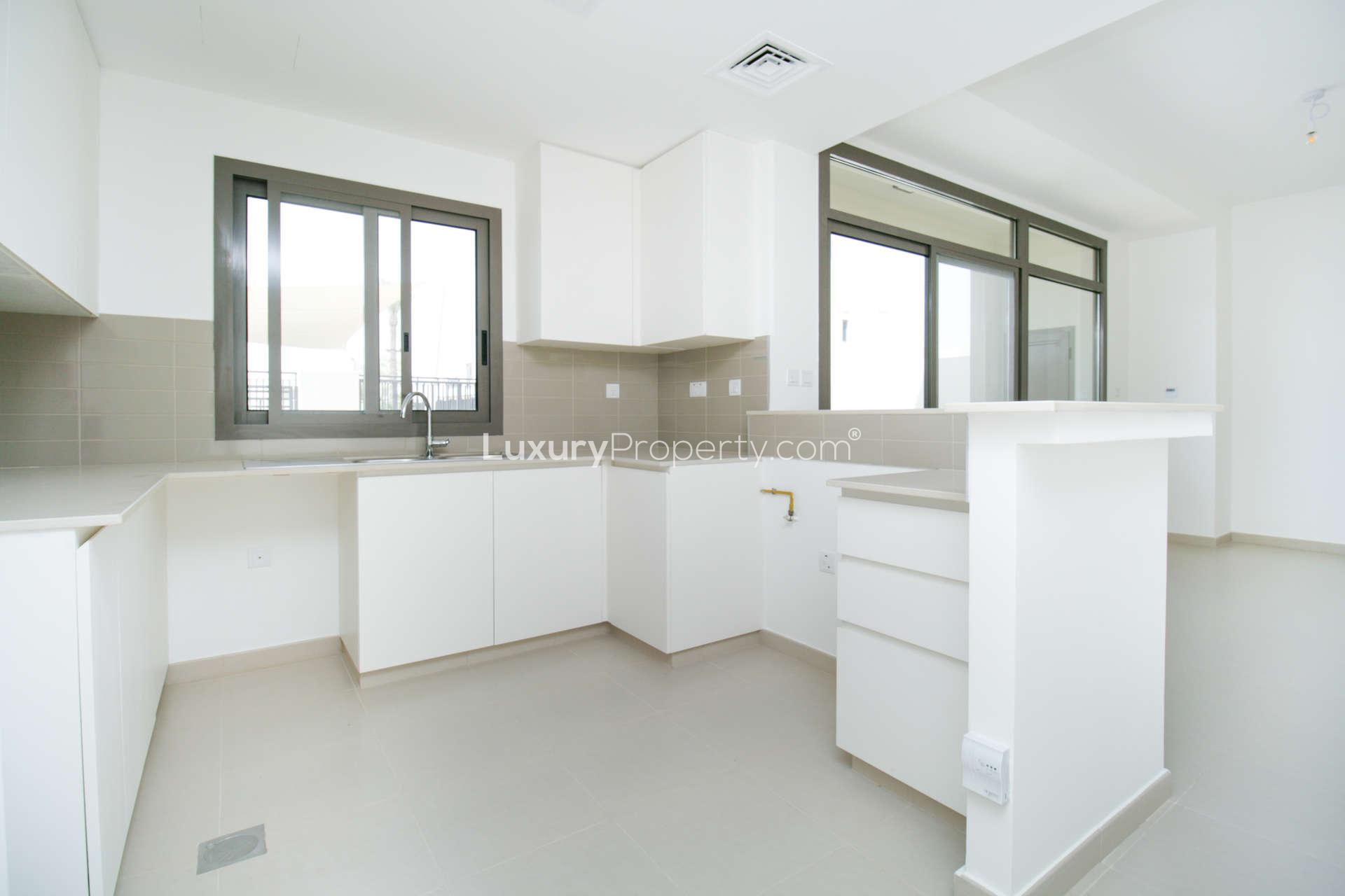 Open-plan living area in 3-bedroom townhouse for rent, Town Square community