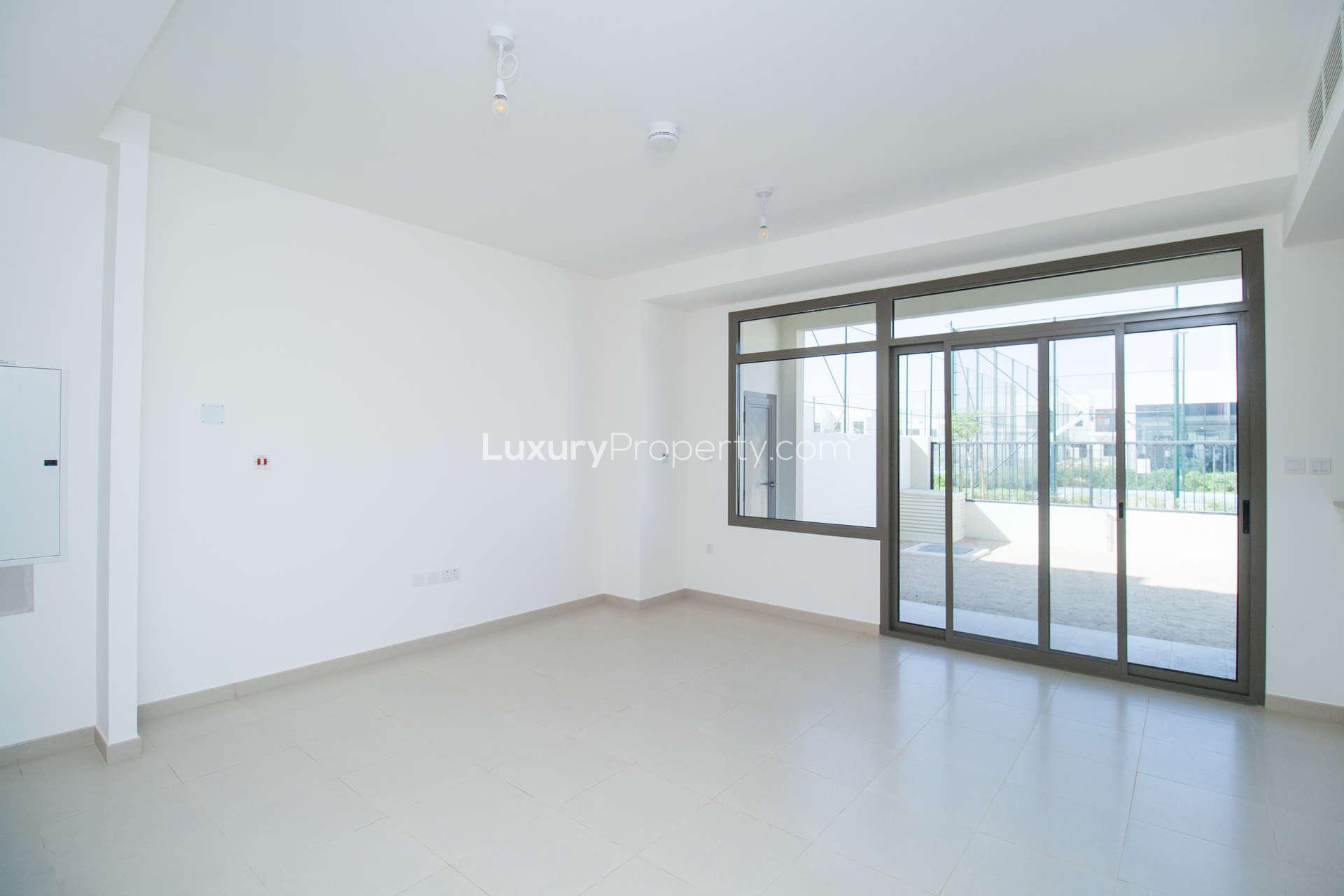 Modern 3-bedroom townhouse exterior in Noor, Town Square, available for rent