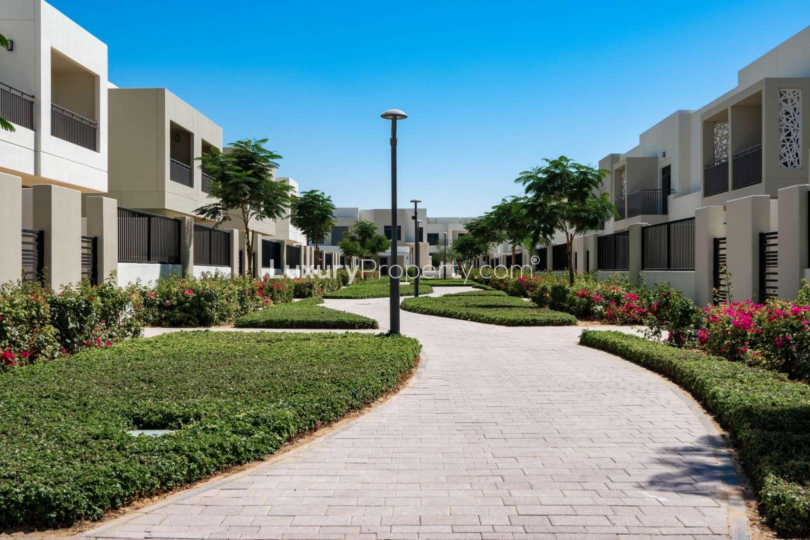 Empty bedroom with built-in closets in 3-bedroom townhouse, Noor Townhouses, Town Square