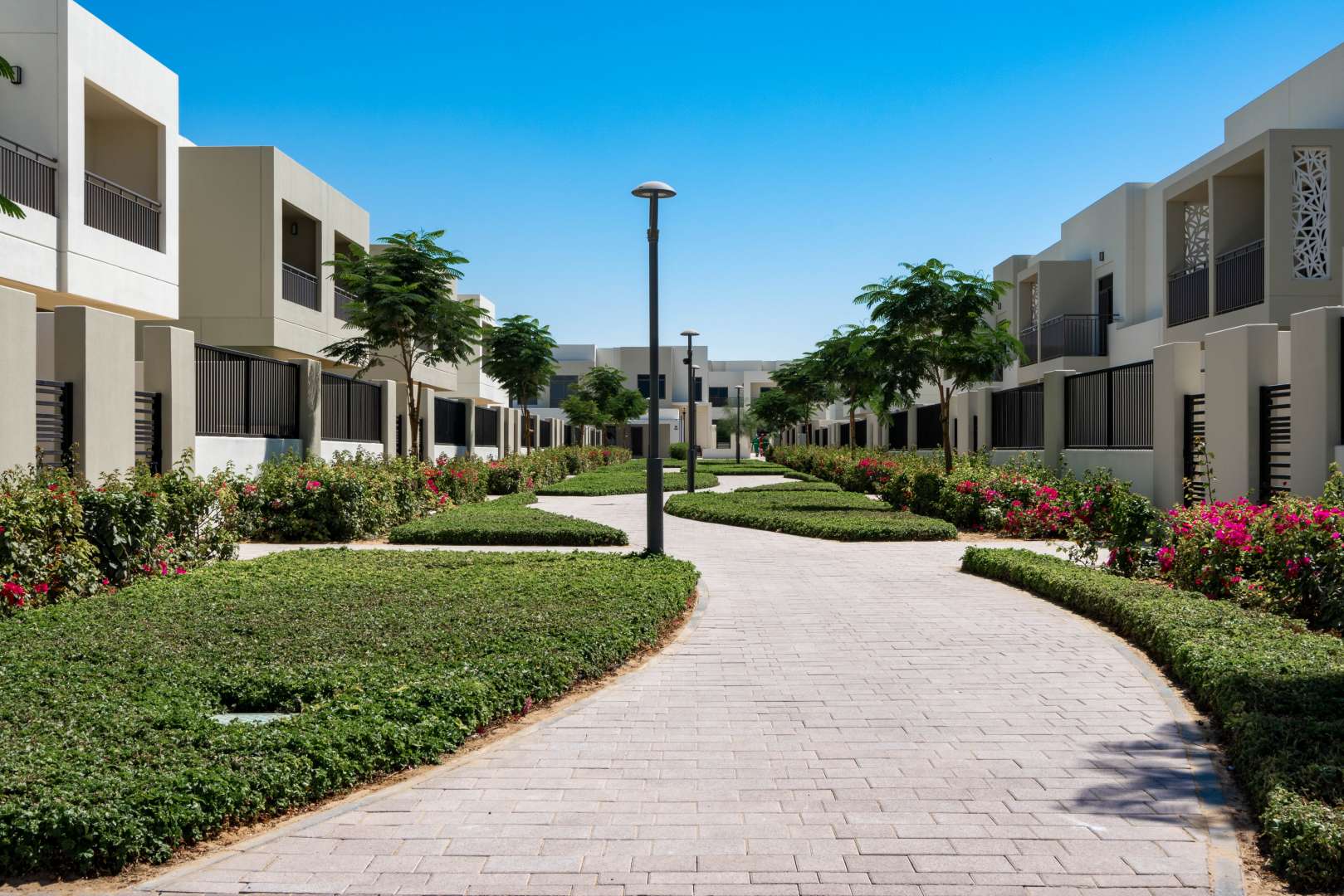 Empty bedroom with built-in closets in 3-bedroom townhouse, Noor Townhouses, Town Square