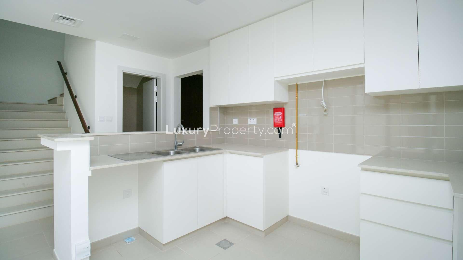Bright kitchen and living area in 3-bedroom townhouse, Noor Town Square, Dubai