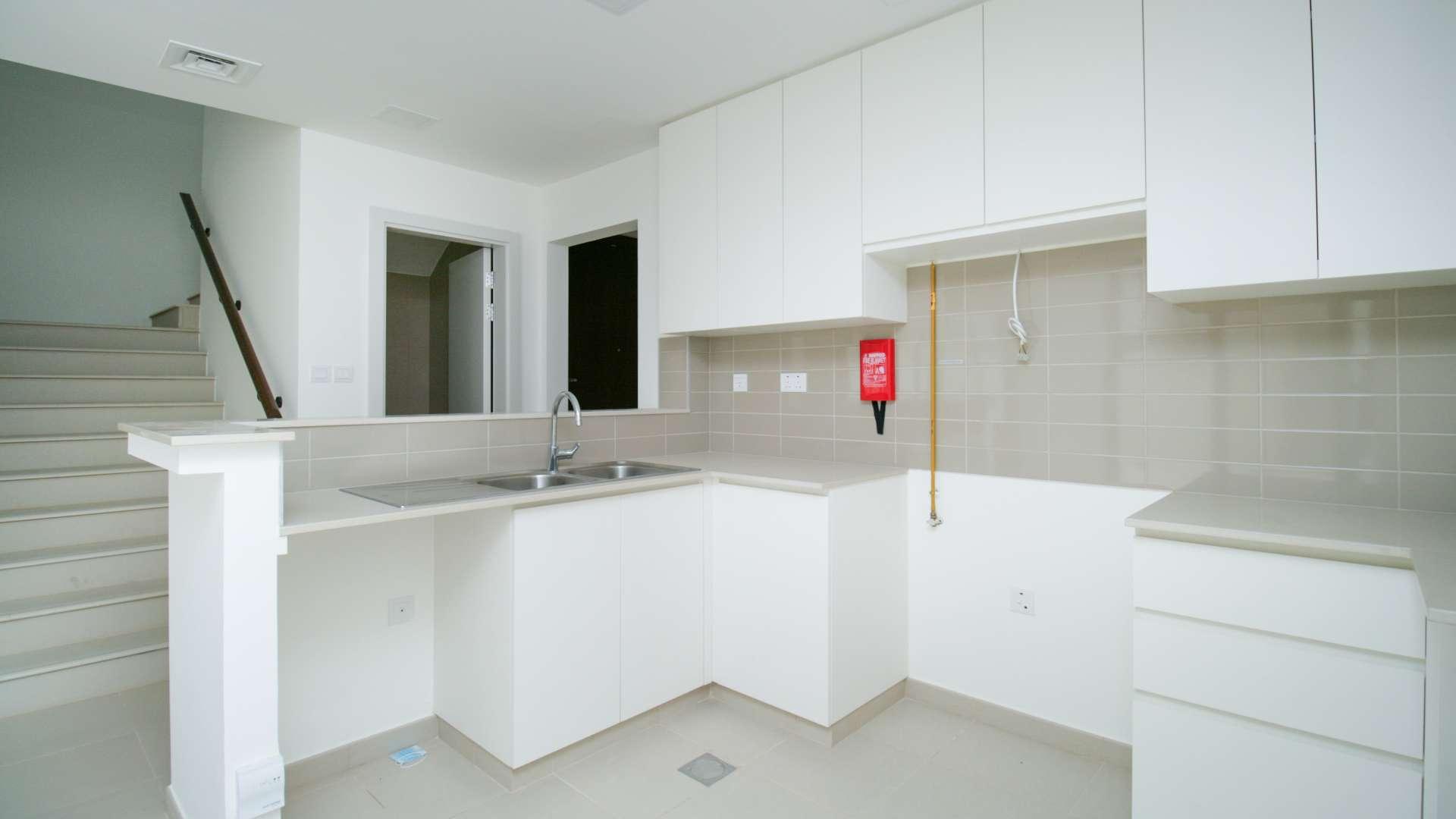 Bright kitchen and living area in 3-bedroom townhouse, Noor Town Square, Dubai