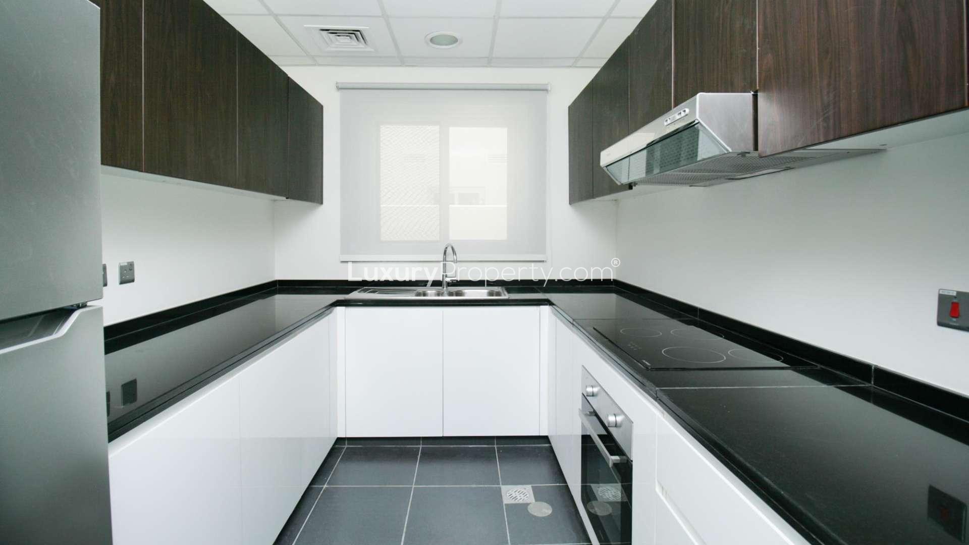 Fully furnished living and dining area in Pacifica townhouse, Damac Hills 2 for rent