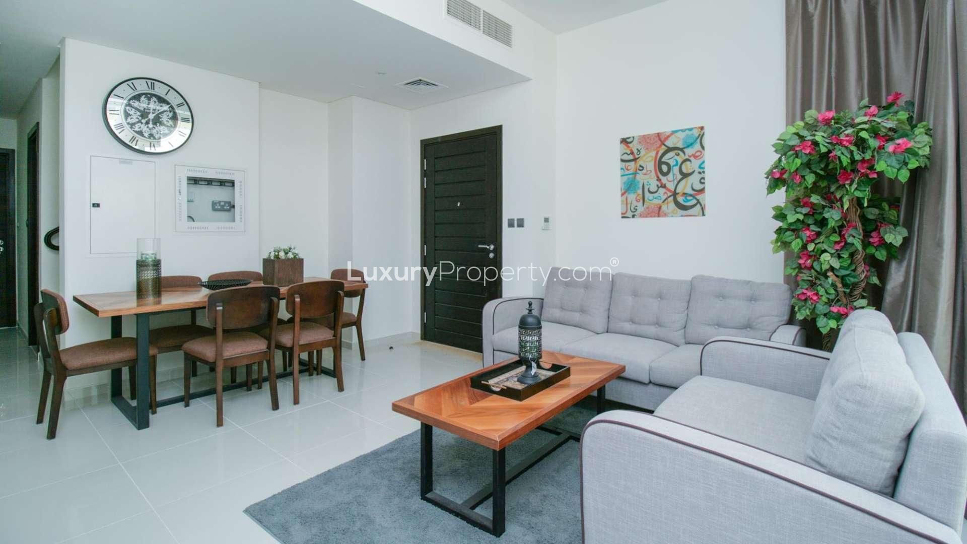 Modern living room in fully furnished 3-bedroom townhouse, Pacifica, Damac Hills 2, for rent