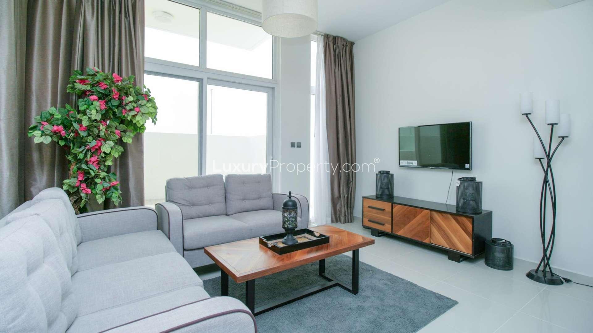Modern 3-bedroom townhouse exterior in Pacifica, Damac Hills 2, available for rent
