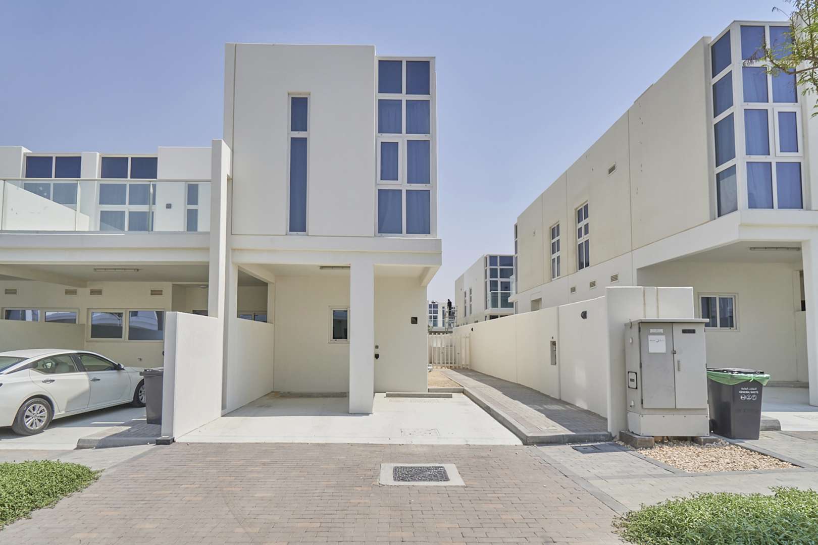 Duplex townhouse exterior in Pacifica, Damac Hills 2, with driveway and modern architecture