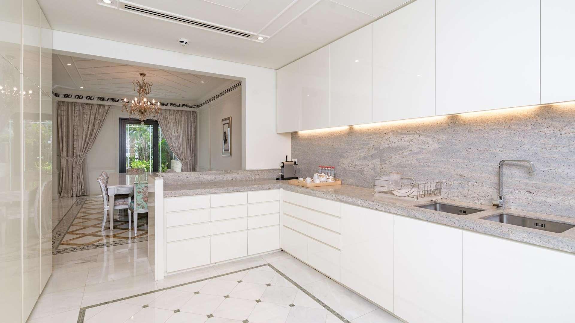 Luxurious living room in furnished townhouse, Palazzo Versace, Culture Village, with pool view