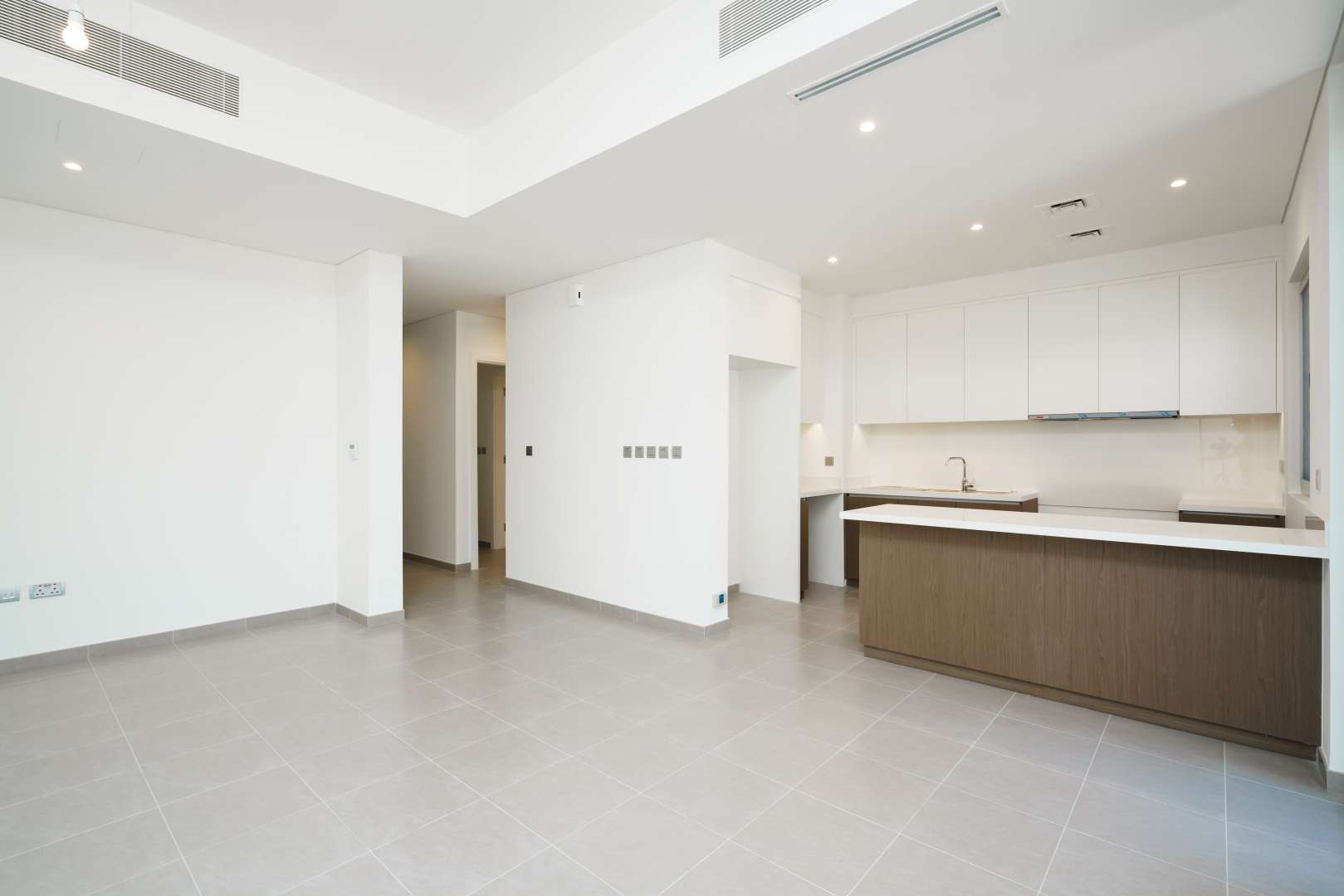 Modern kitchen and living area in 1M townhouse, Reem Community, Arabian Ranches 2