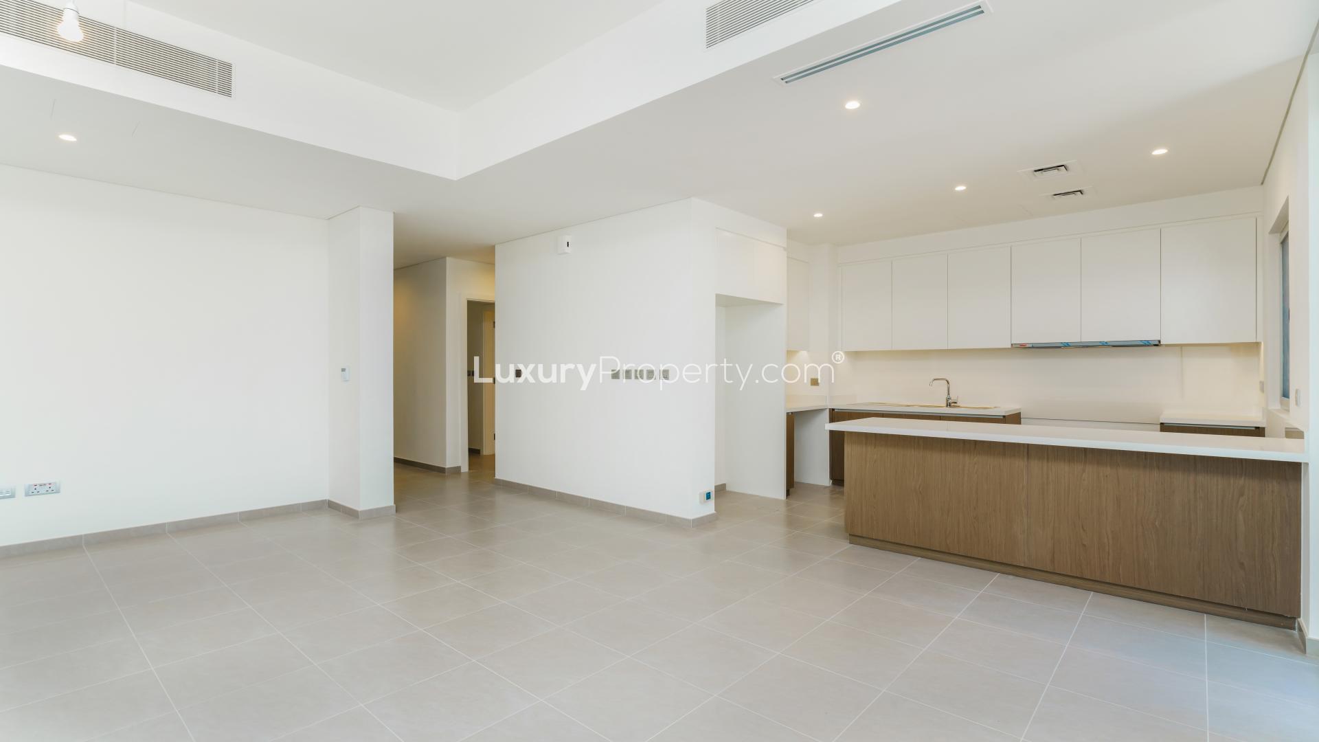 Open-plan kitchen and living area in Arabian Ranches 2 townhouse for rent