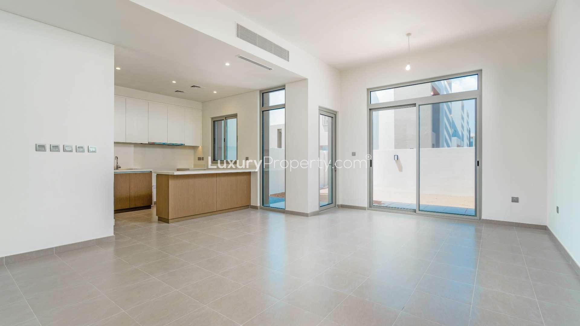 Exterior view of townhouse garden with patio in Arabian Ranches 2 Reem Community