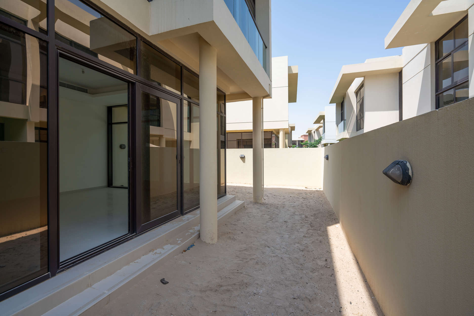 Exterior view of Richmond townhouse in Damac Hills, showcasing private outdoor space