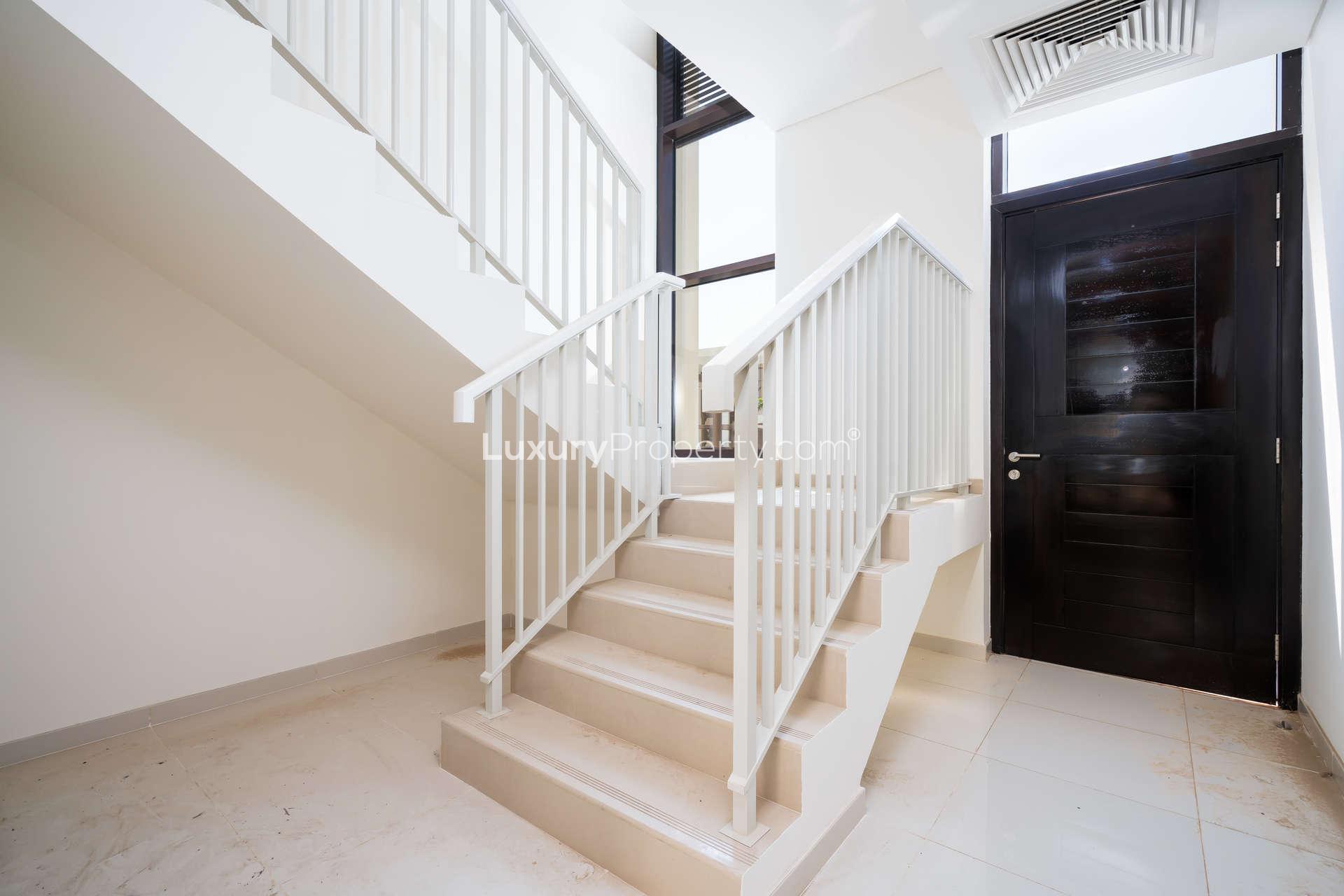 Exterior view of modern townhouse for rent in Richmond, Damac Hills community