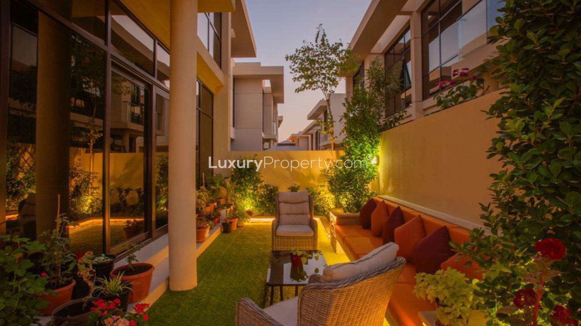 Upgraded garden with dining area in Rochester townhouse, Damac Hills, available for rent
