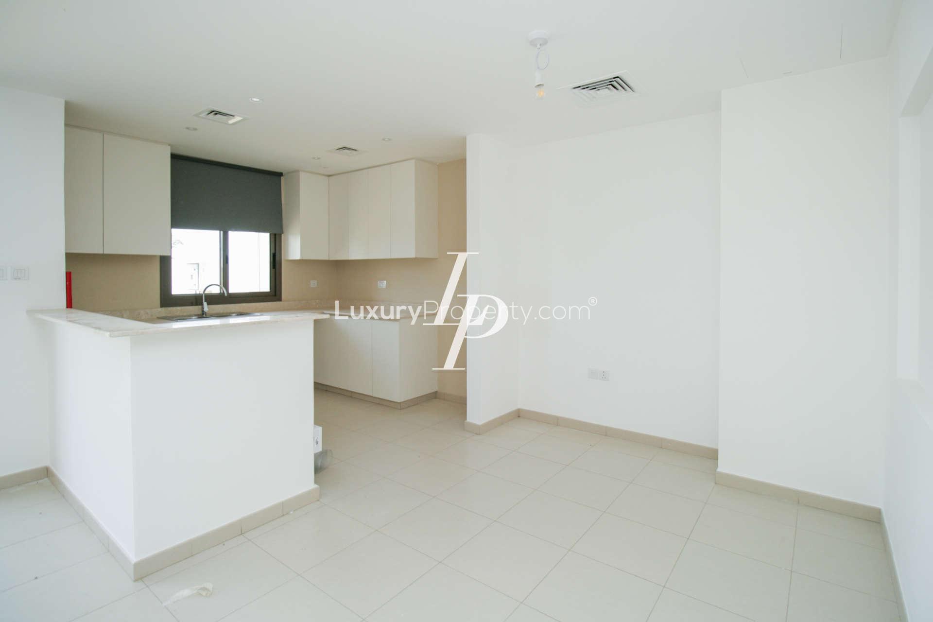 "Spacious living area in vacant 3-bedroom townhouse for rent, Safi, Town Square.",Vacant kitchen in 3-bedroom townhouse for rent, Safi Townhouses, Town Square