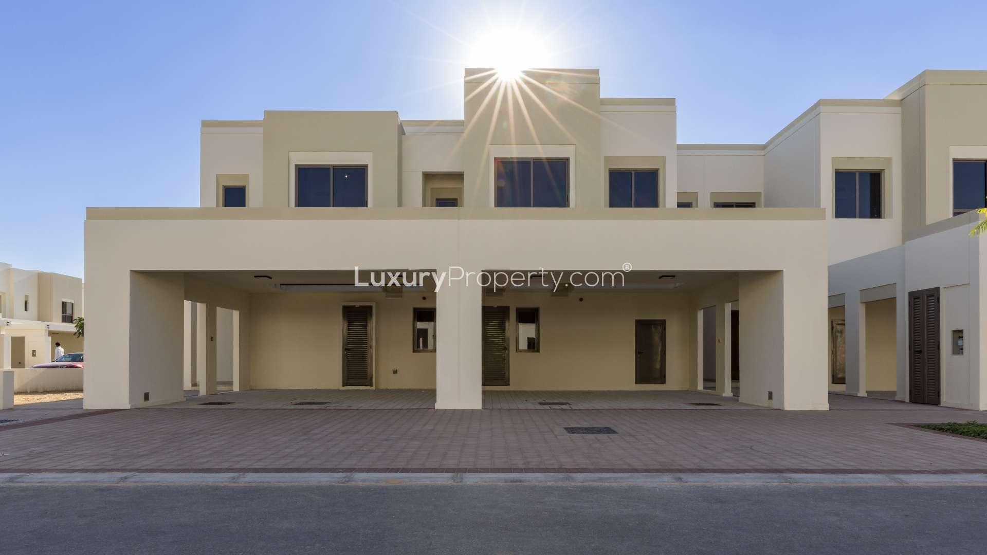 Brand new 3-bedroom townhouse exterior in Sama, Town Square, with garden view