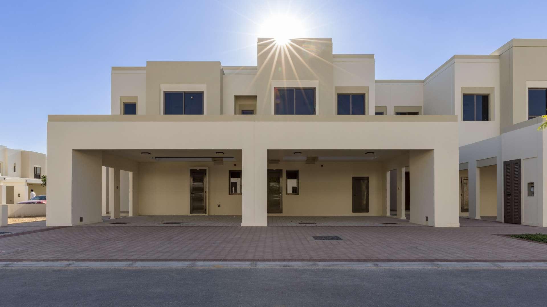 Brand new 3-bedroom townhouse exterior in Sama, Town Square, with garden view