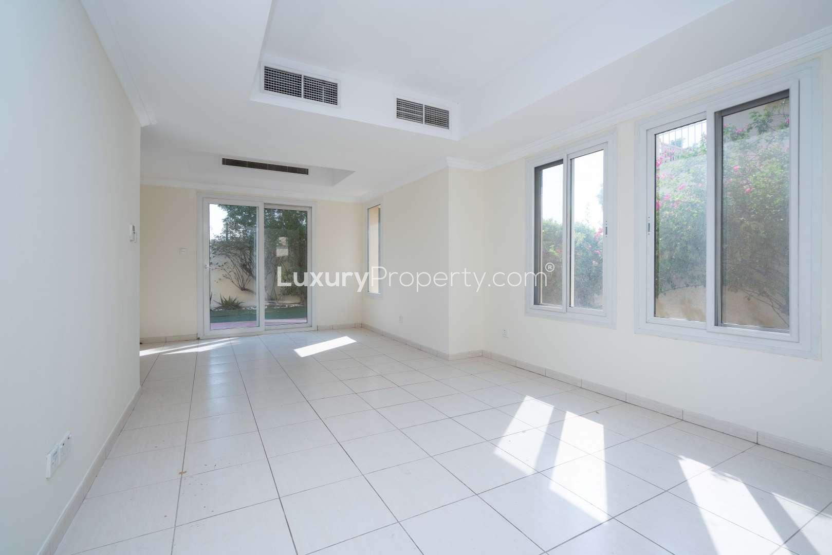 Spacious living room in vacant Springs 4 townhouse for rent, natural light and garden view