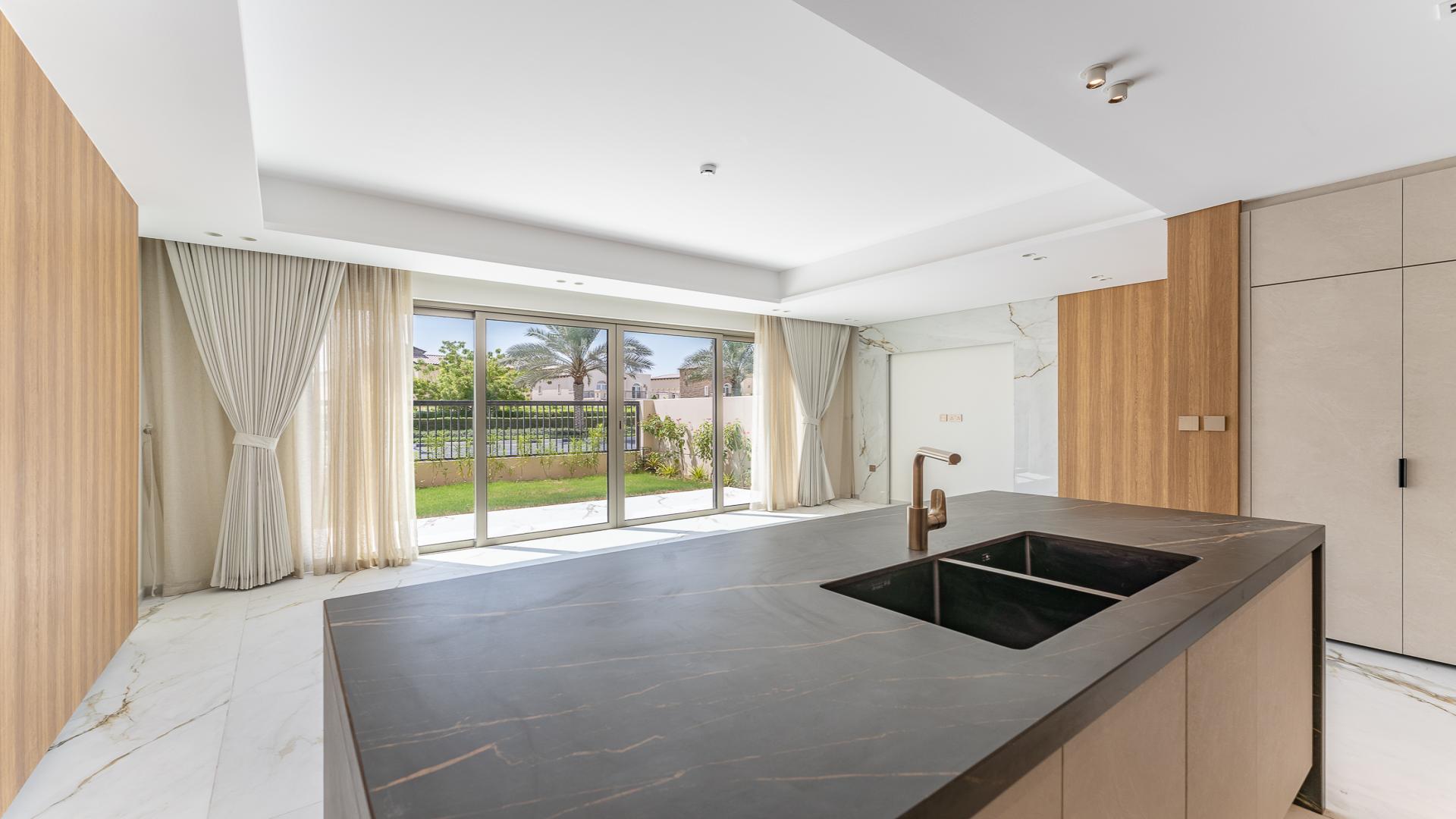 Exterior view of 3-bedroom townhouse garden in Jasmine Lane, Jumeirah Golf Estates