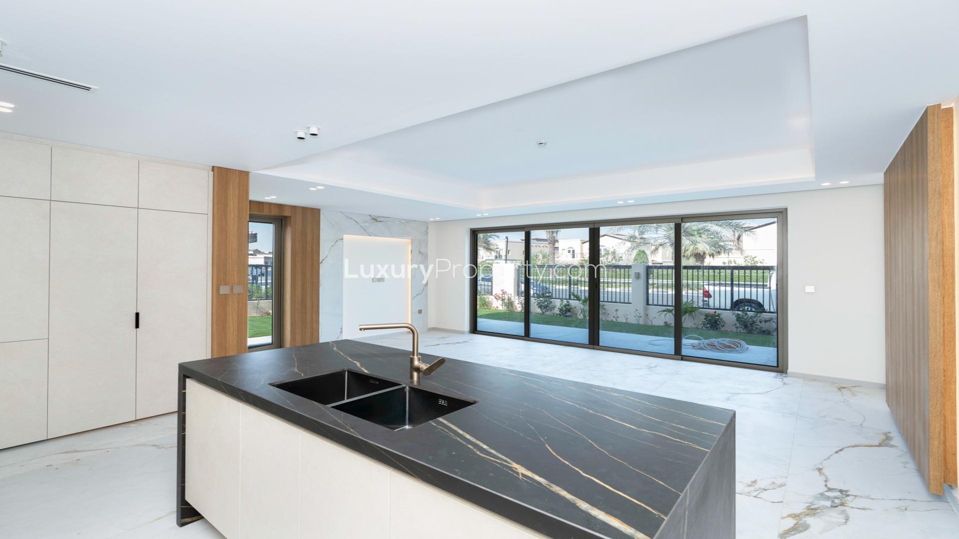 Modern 3-bedroom townhouse exterior in Jasmine Lane, Jumeirah Golf Estates for rent