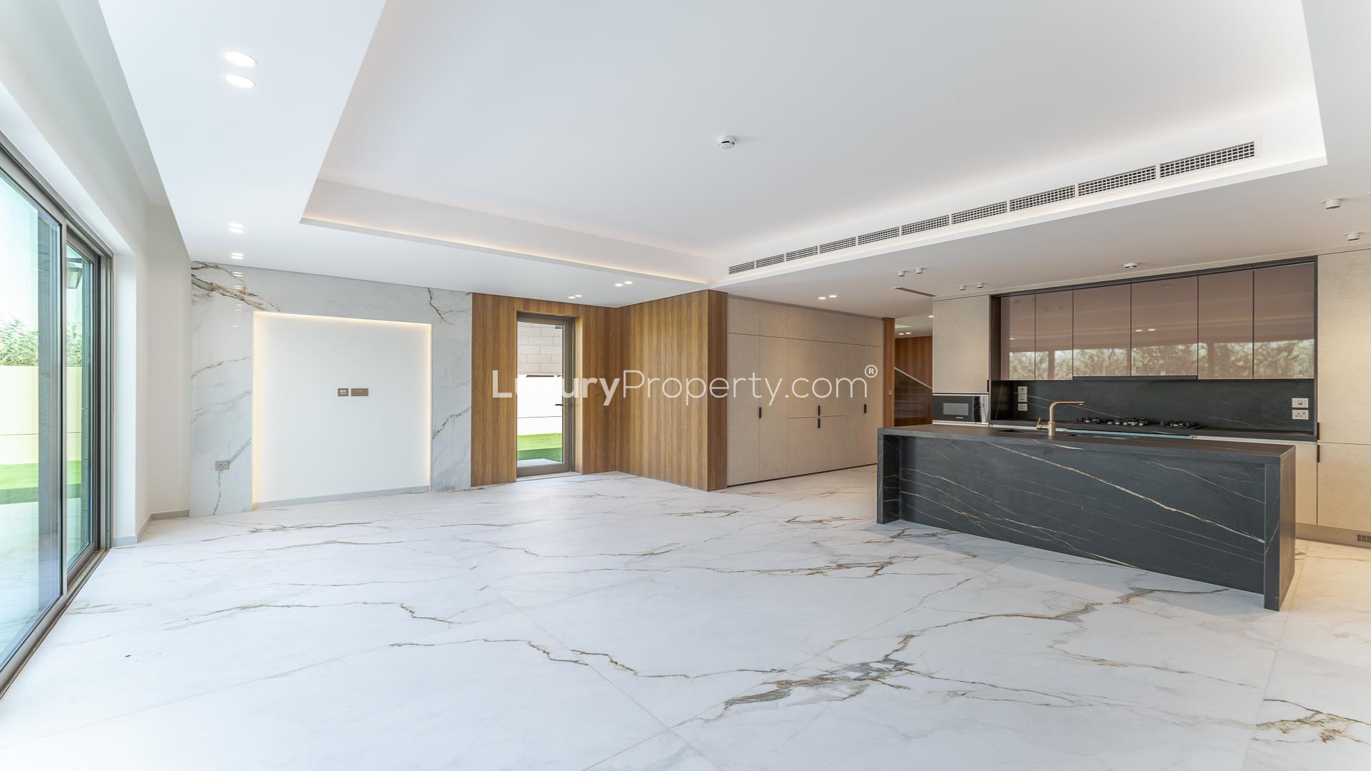 Exterior view of 3-bed townhouse with spacious backyard in Jasmine Lane, Jumeirah Golf Estates