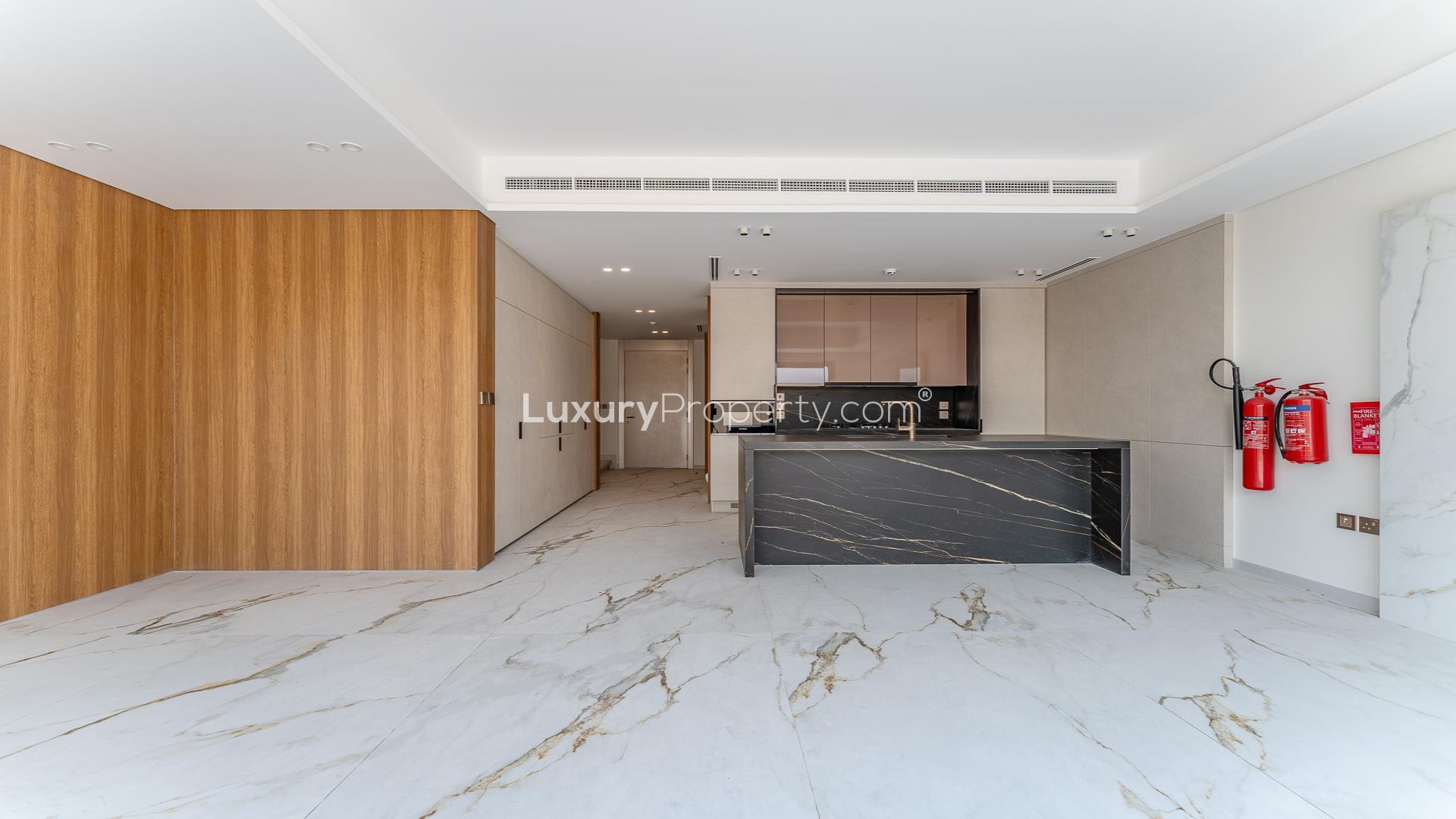 Modern kitchen with marble flooring in Jumeirah Golf Estates townhouse for rent, Jasmine Lane
