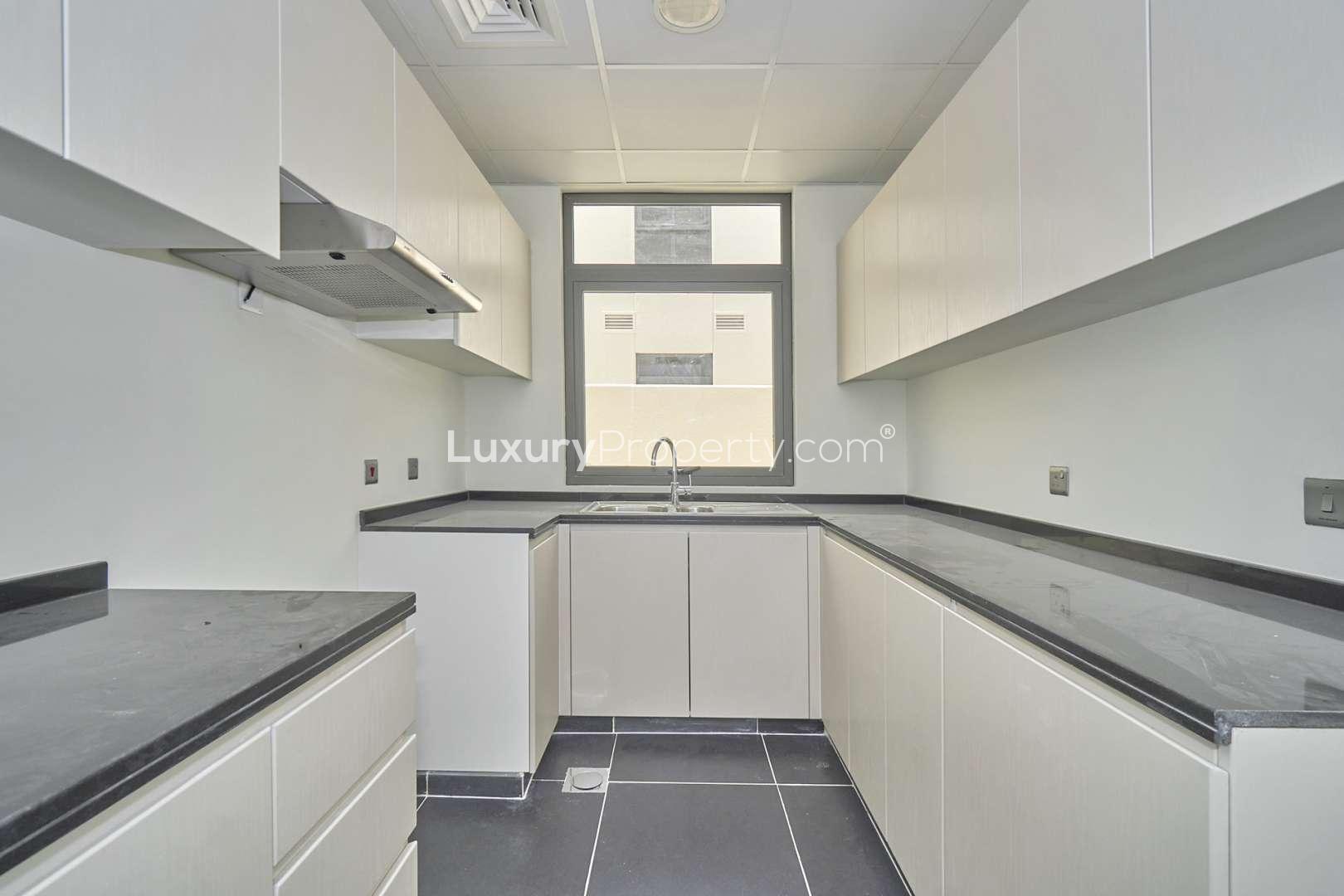 3-bedroom townhouse interior with large windows in Sycamore, Akoya community