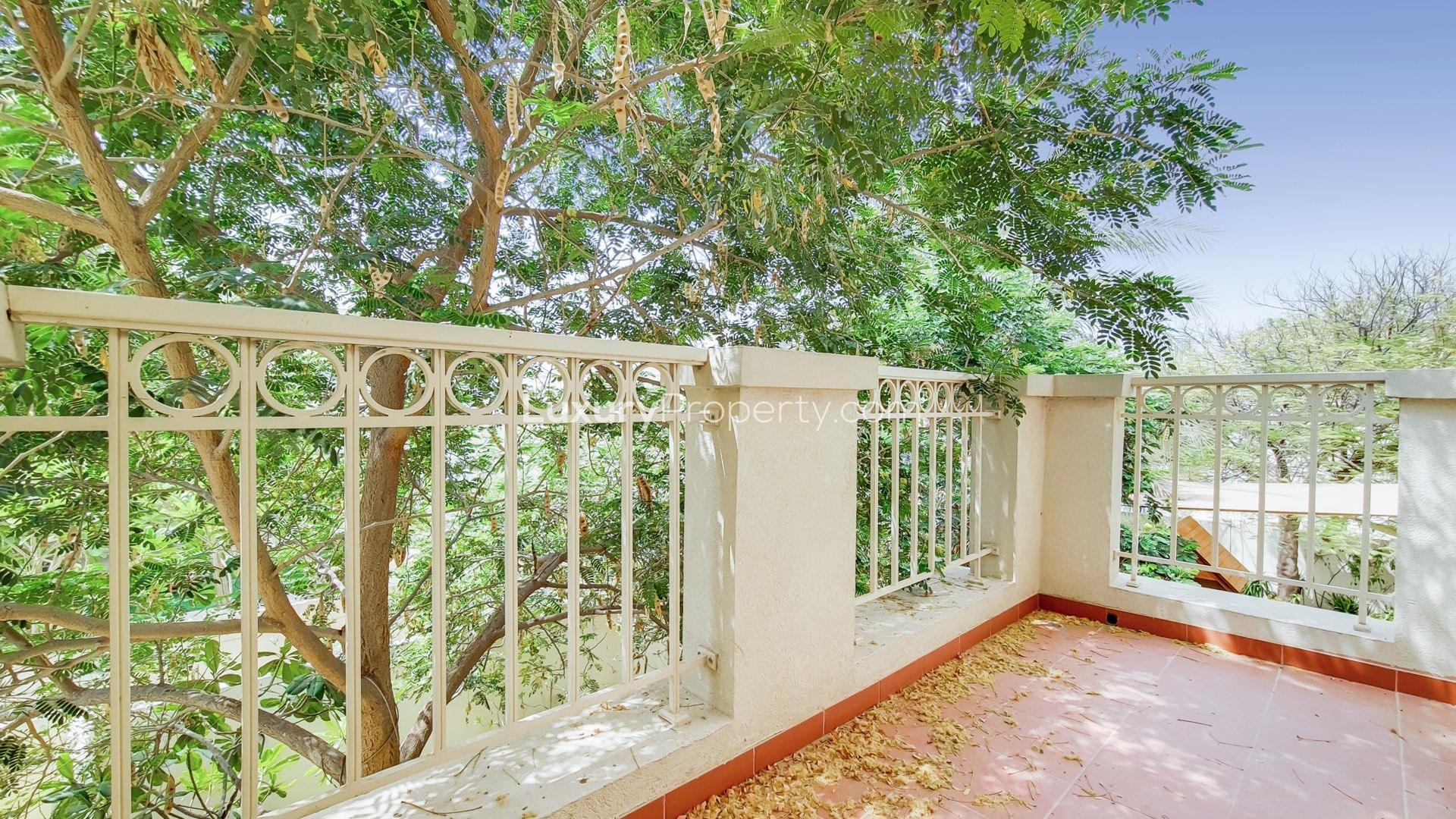 Partially upgraded villa with garden view in The Springs, featuring large sliding glass doors