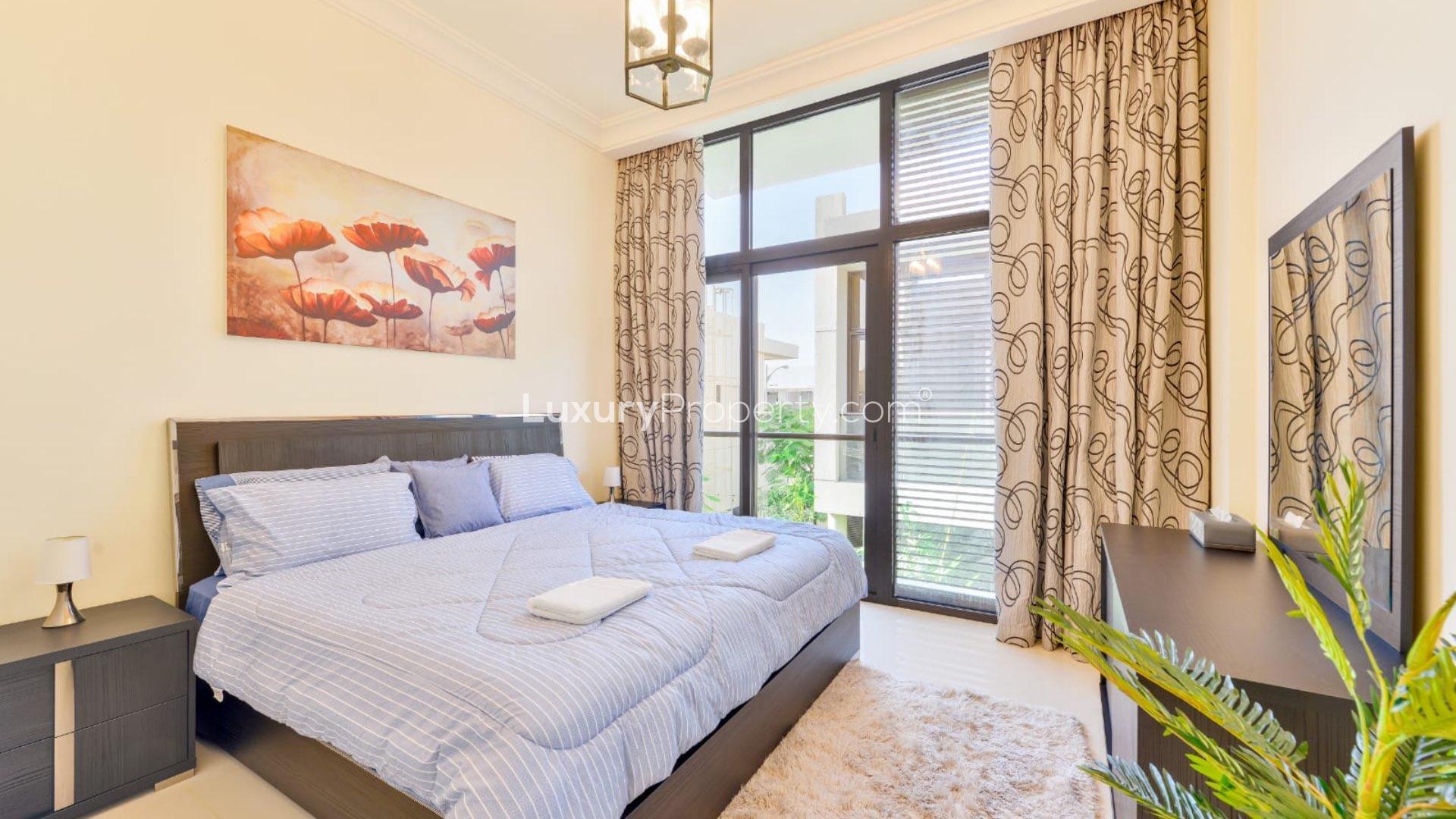 Landscaped garden view of fully furnished townhouse for rent in Topanga, Damac Hills