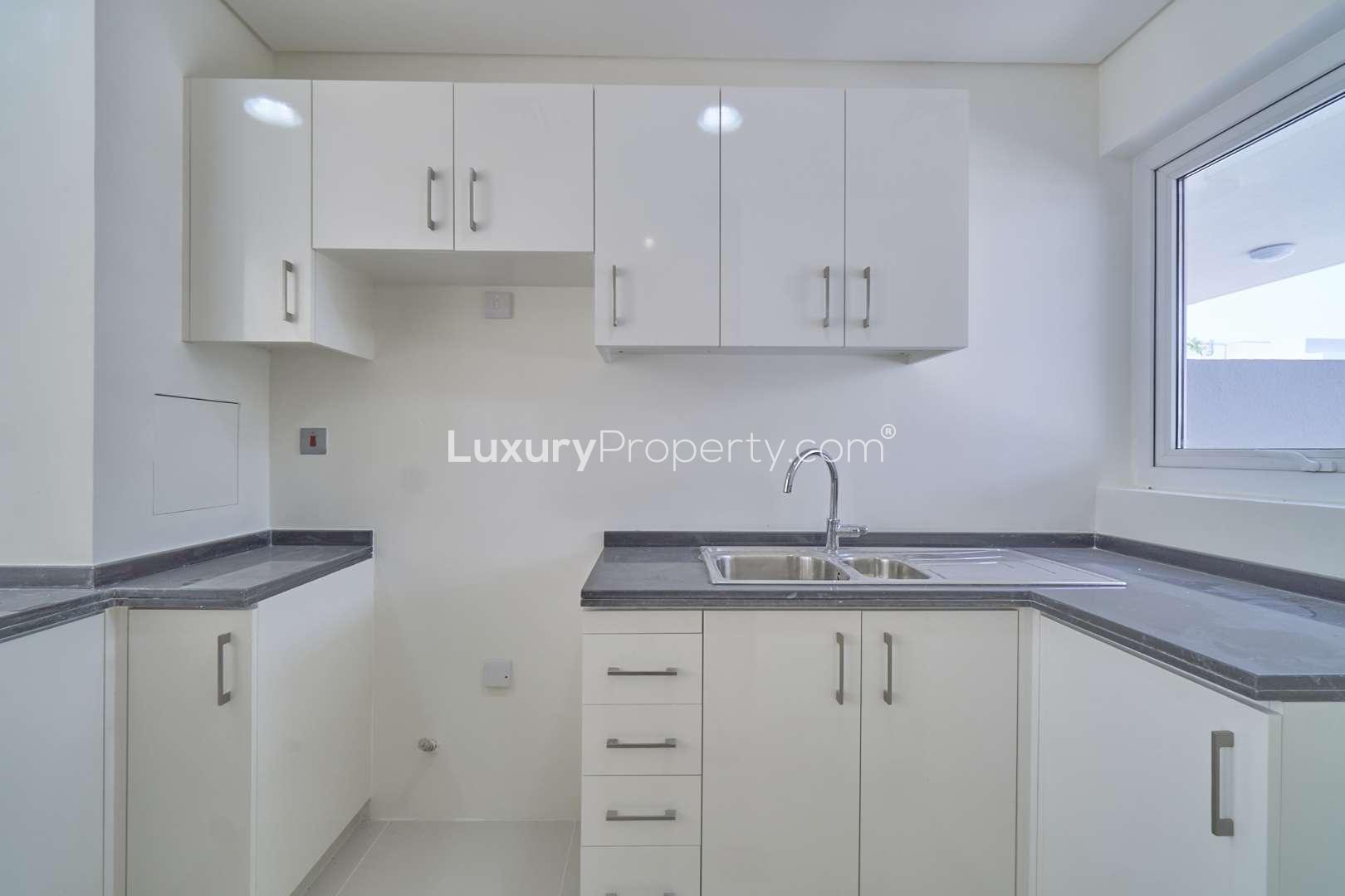 Modern 3-bedroom townhouse exterior in Vardon, Akoya Oxygen community, available for rent