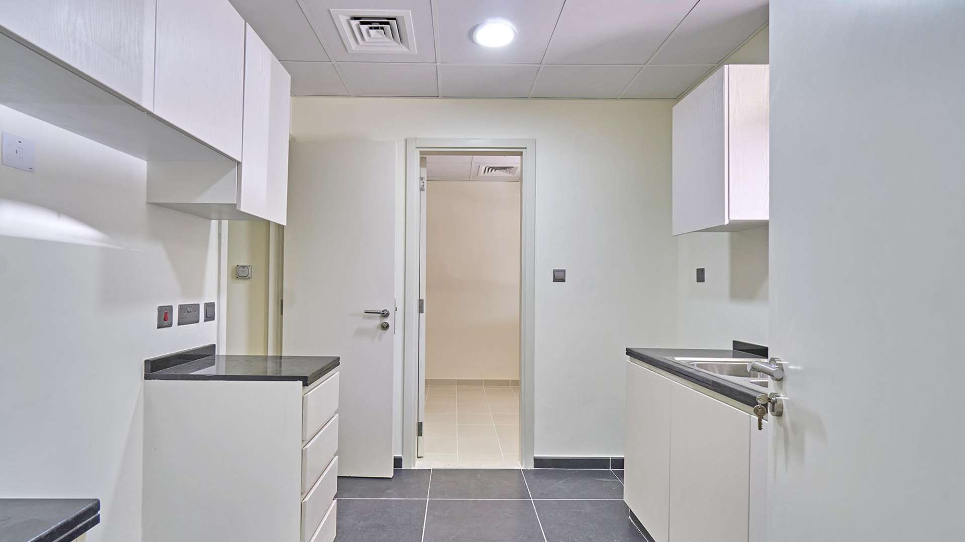 Front view of modern three-bedroom townhouse for rent in Zinnia, Akoya Oxygen