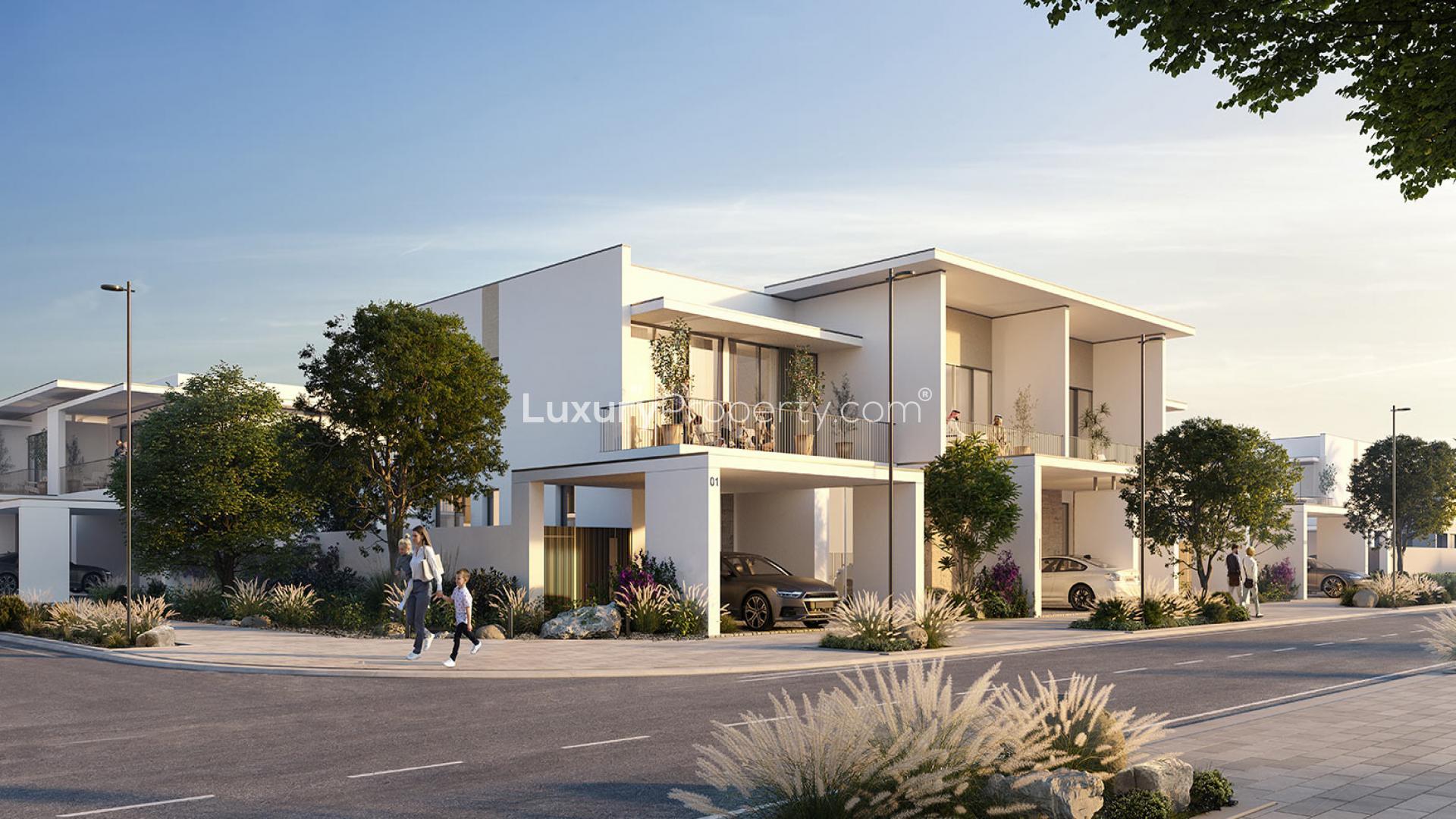 Modern living room in Lillia townhouse, featuring elegant furniture and large windows