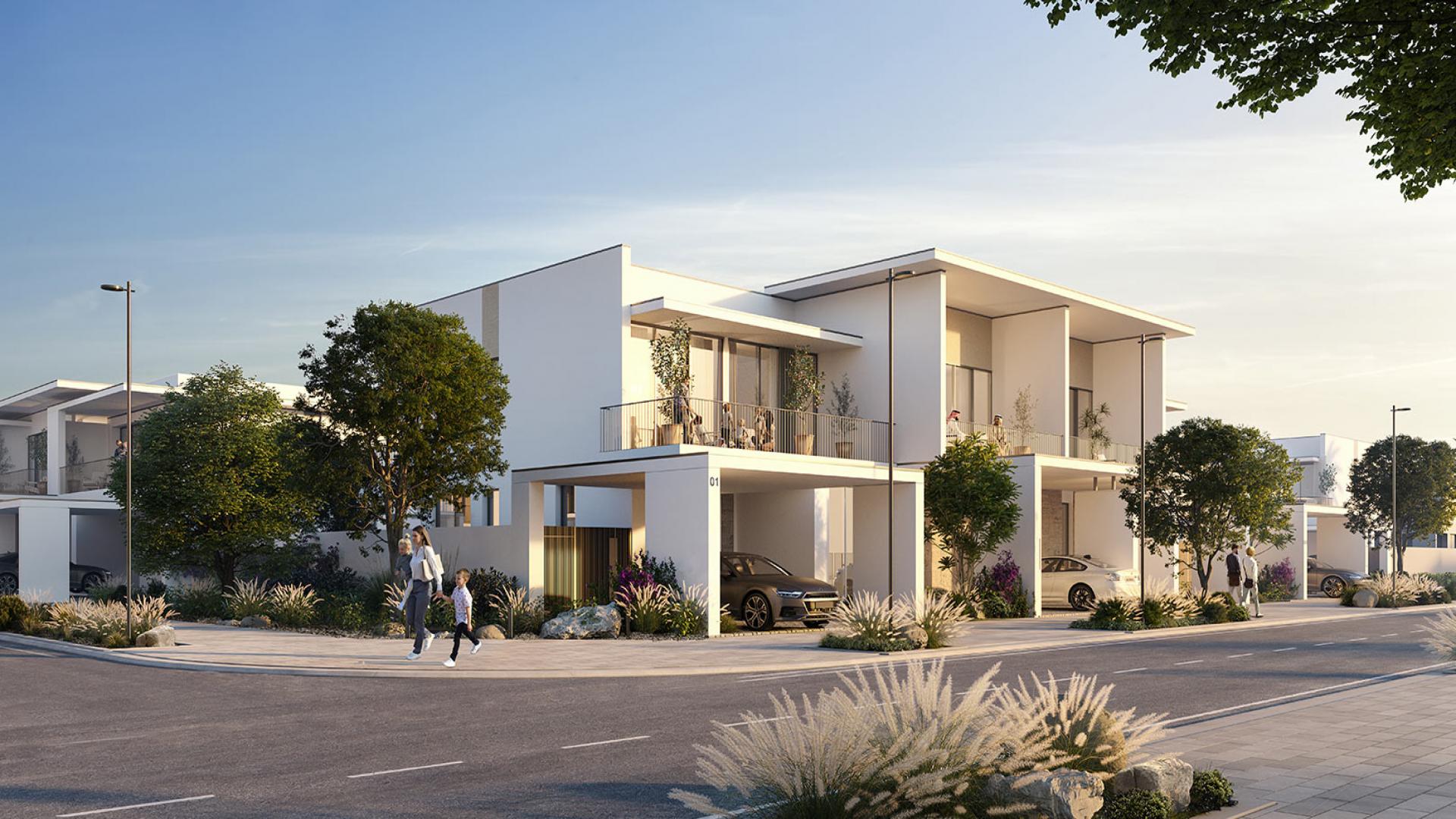 Modern living room in Lillia townhouse, featuring elegant furniture and large windows