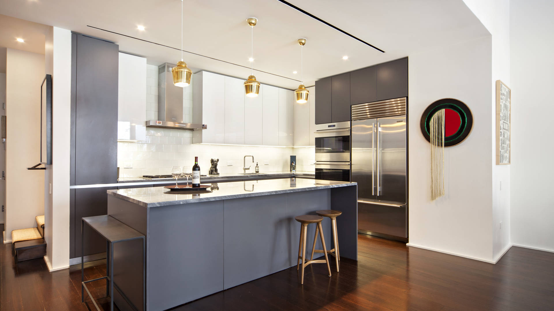 Luxurious outdoor patio with seating and fireplace in Manhattan townhouse, 10 Bond Street, New York