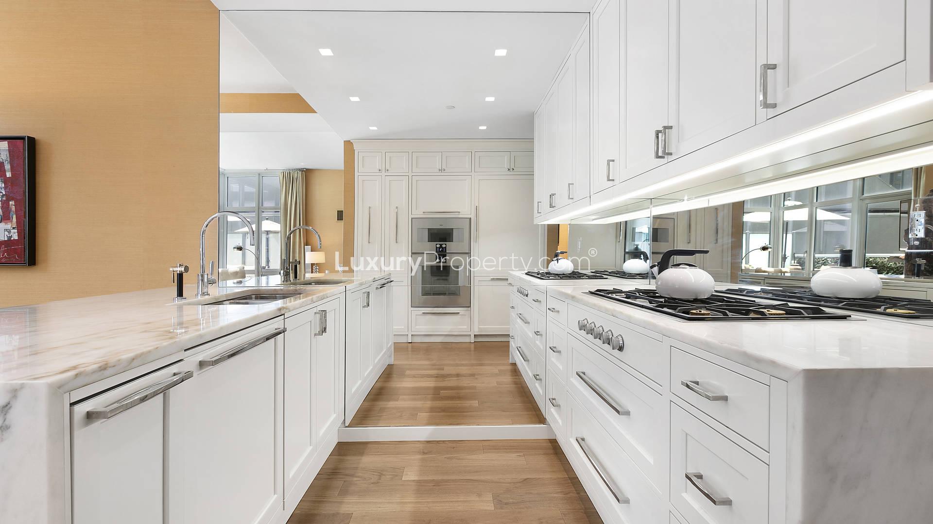 Luxurious interior of Manhattan townhouse duplex with modern staircase and elegant decor