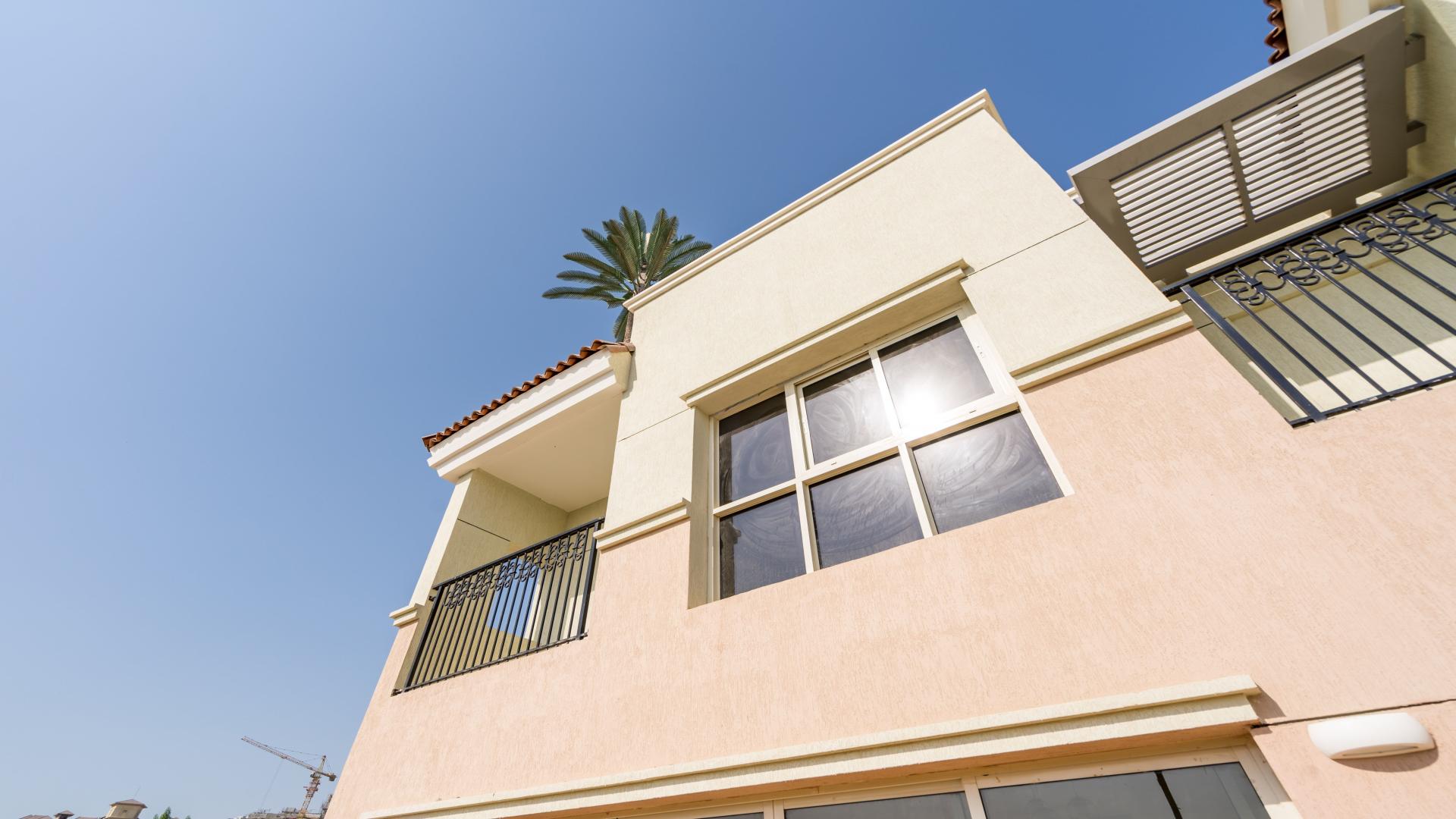 Bright living room in vacant single row townhouse, Al Andalus, Jumeirah Golf Estates