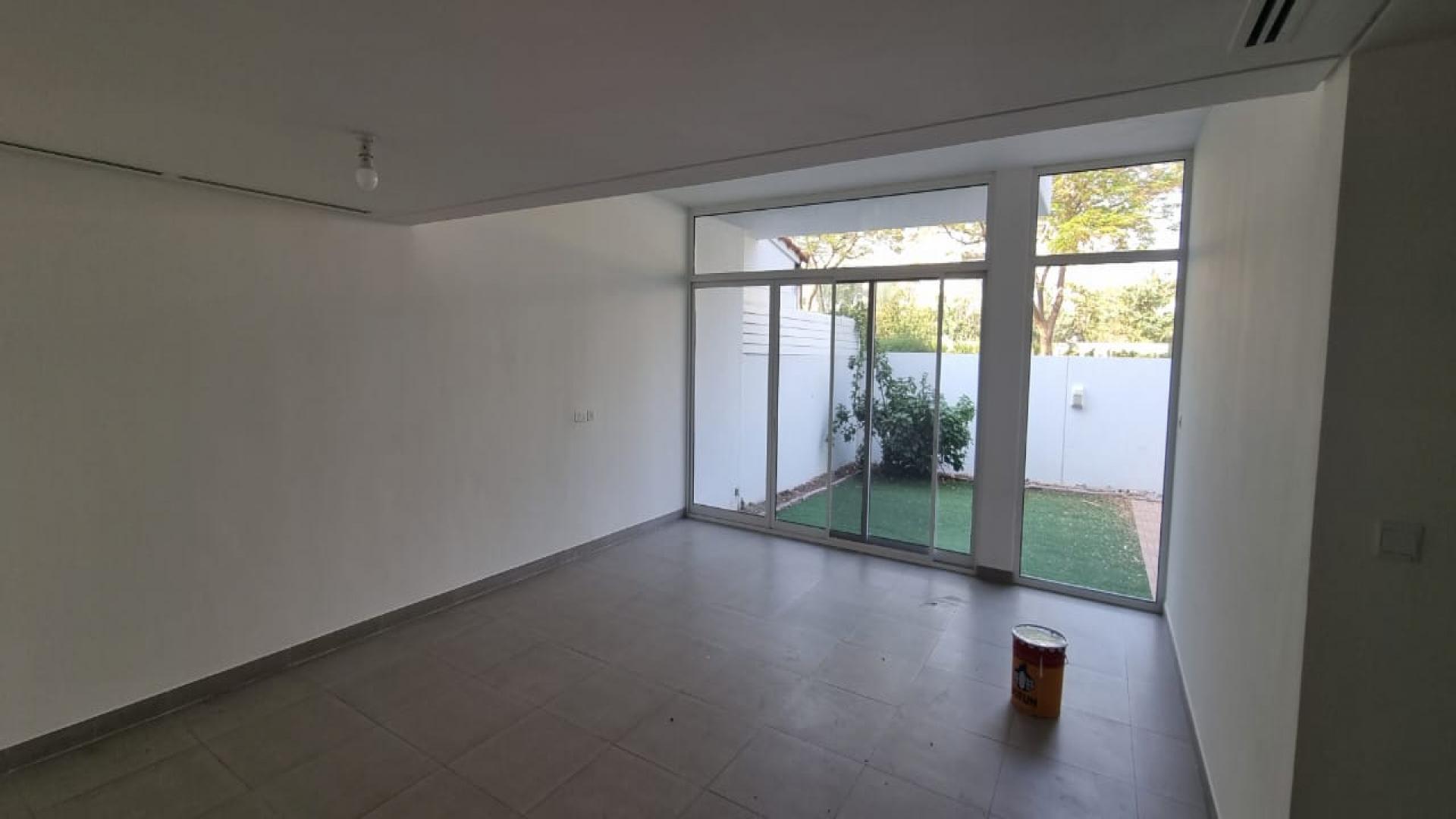 Modern exterior of 3-bed townhouse for sale in Arabella 3, Mudon community