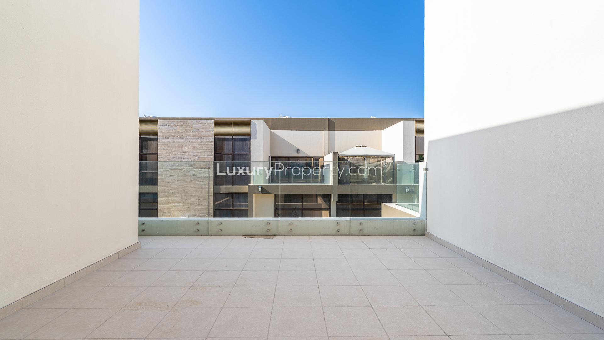 Modern Elie Saab Vie townhouse exterior in Meydan, featuring large windows and elegant design