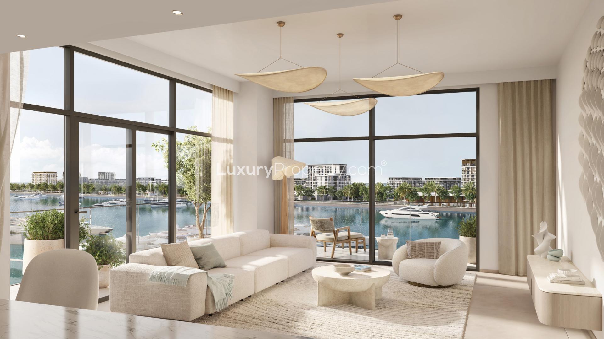 Emaar Porto View townhouse exterior with palm trees and luxury cars at Mina Rashid