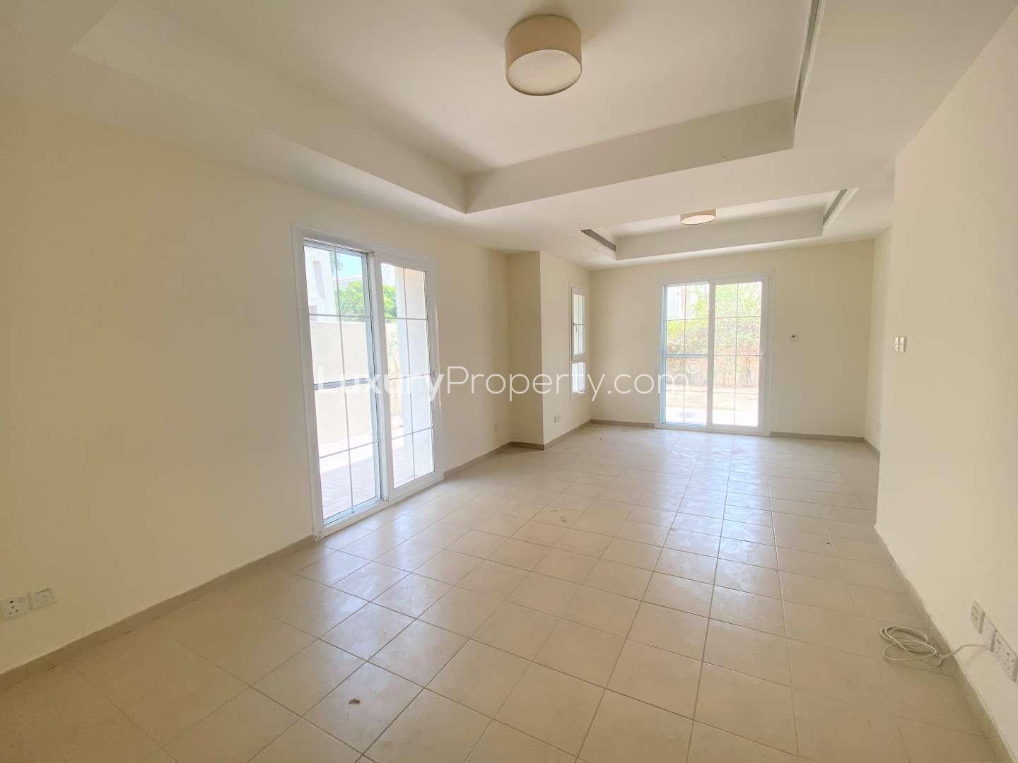 Exterior view of 3-bedroom villa in Al Reem 3, Arabian Ranches with garden path