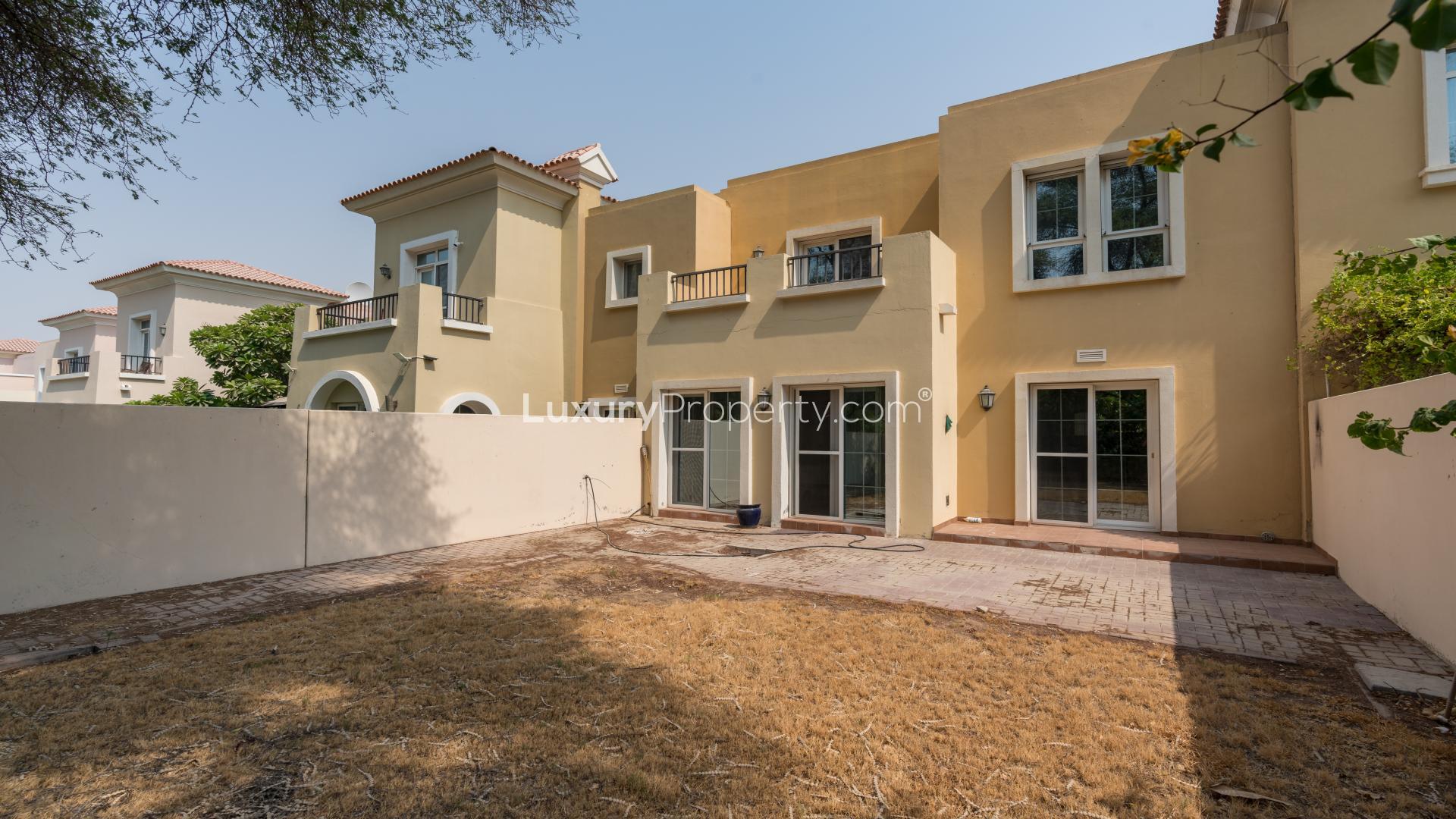 Spacious living room with tiled floors in Al Reem villa, Arabian Ranches