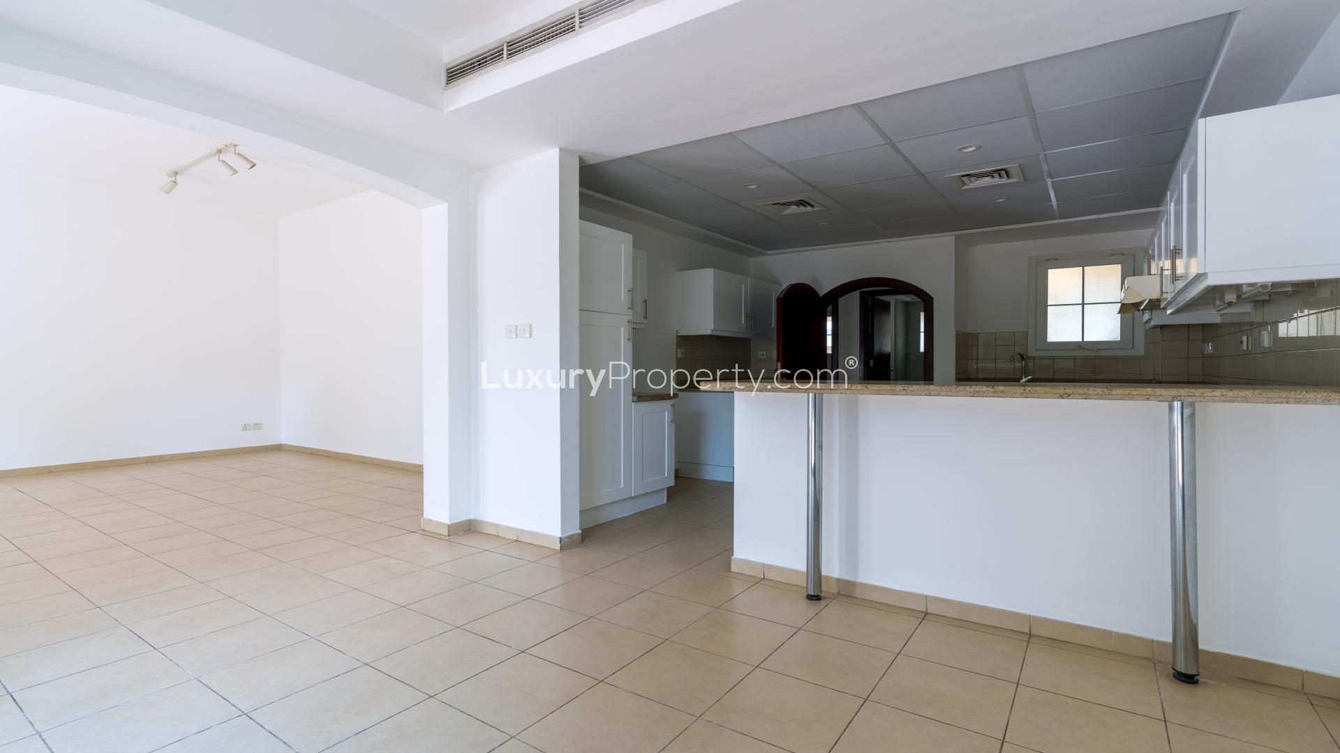 Bright kitchen in 3-bedroom villa for sale, Al Reem, Arabian Ranches, with garden access