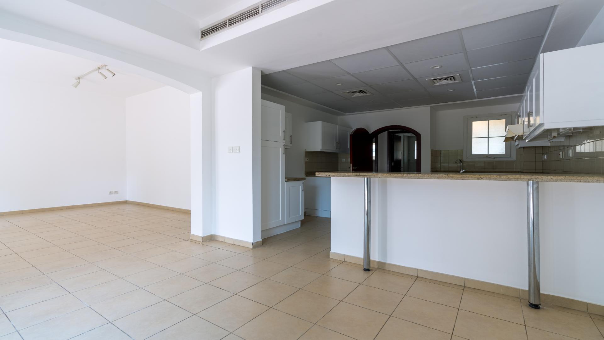 Bright kitchen in 3-bedroom villa for sale, Al Reem, Arabian Ranches, with garden access